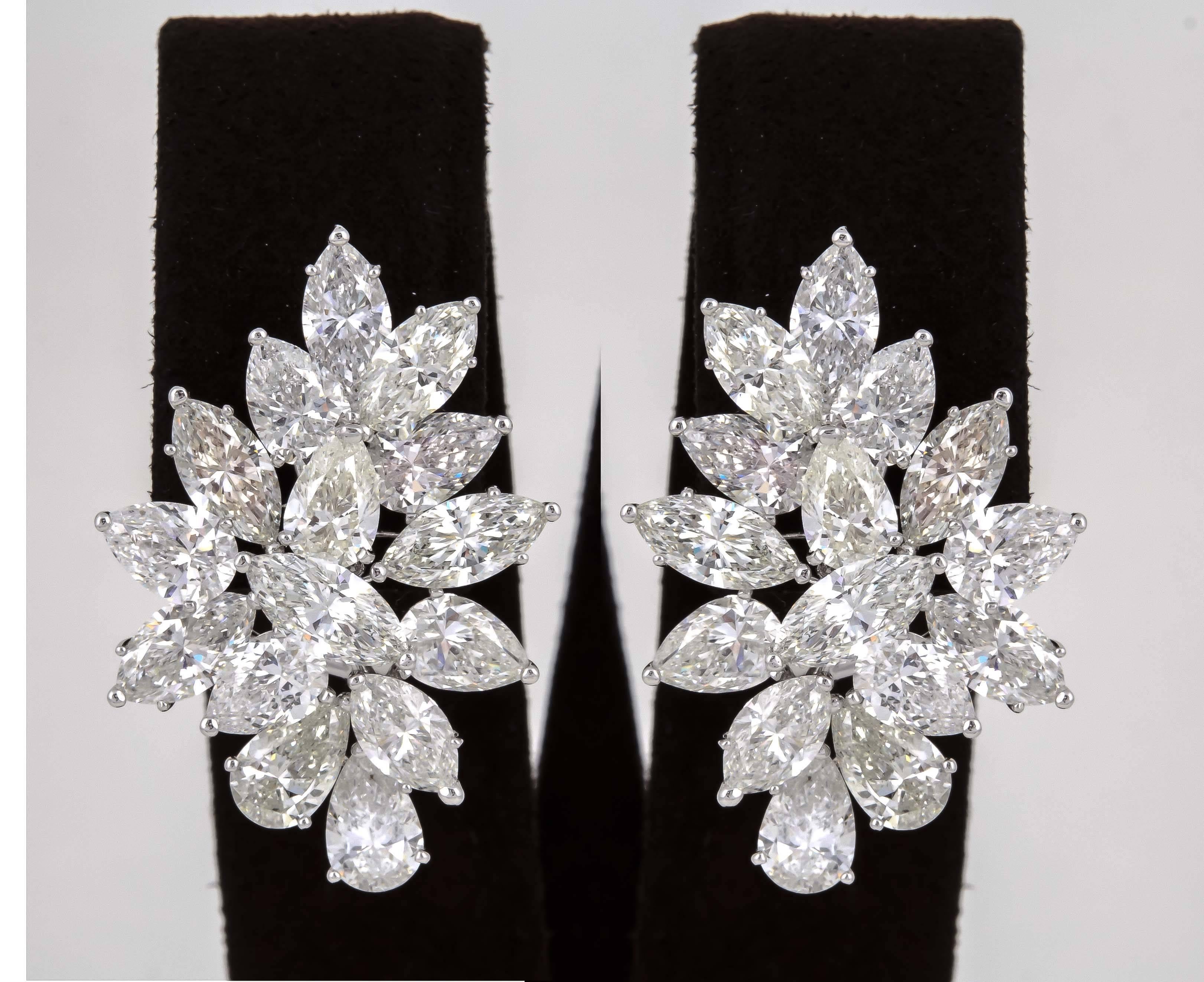 

An amazing pair of diamond earrings!

16.38 carats of pear shape and marquise cut diamonds set in a timeless design. 

Diamonds are G color VS clarity set in 18k white gold 

Approximately 1.25 inches from the highest to lowest point, and .85