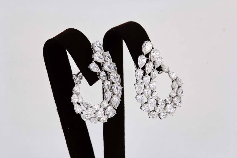 Women's Diamond Scene Stunning Pear Shaped Diamond Gold Swirl Earrings For Sale