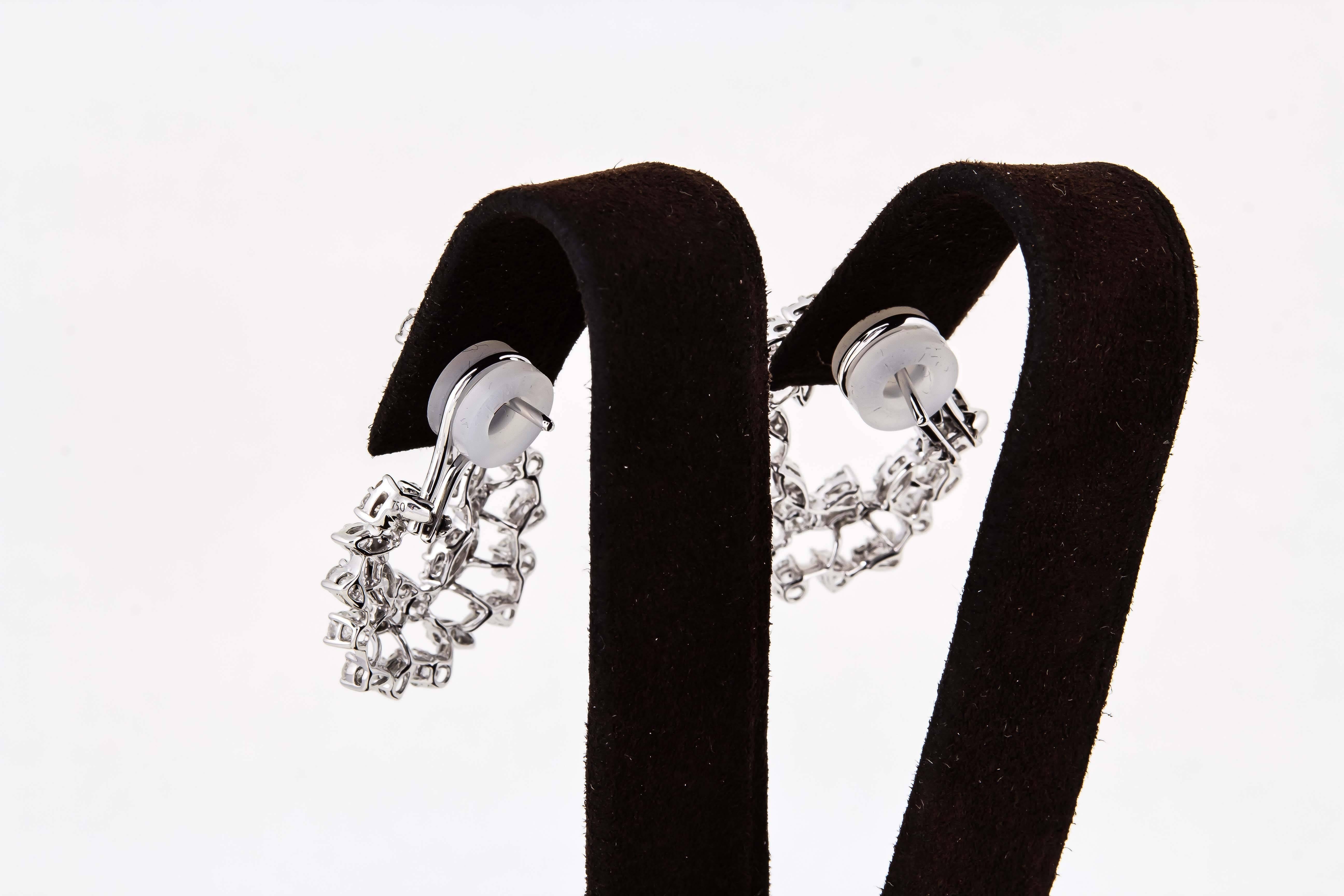 Women's Diamond Scene 3.91 Carat Diamonds Gold Swirl Hoop Earrings For Sale