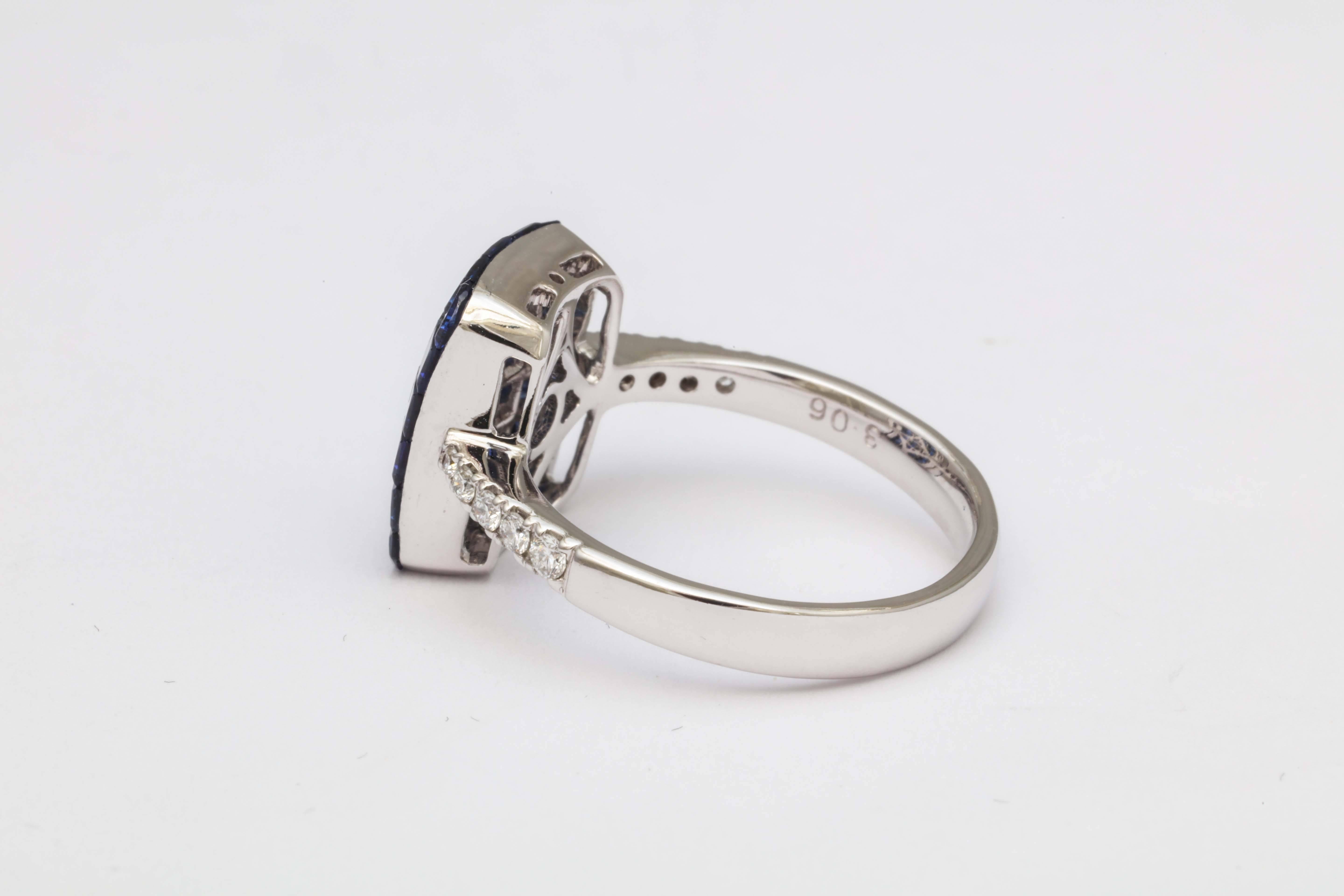 Contemporary Invisible Set Sapphire and Diamond Ring