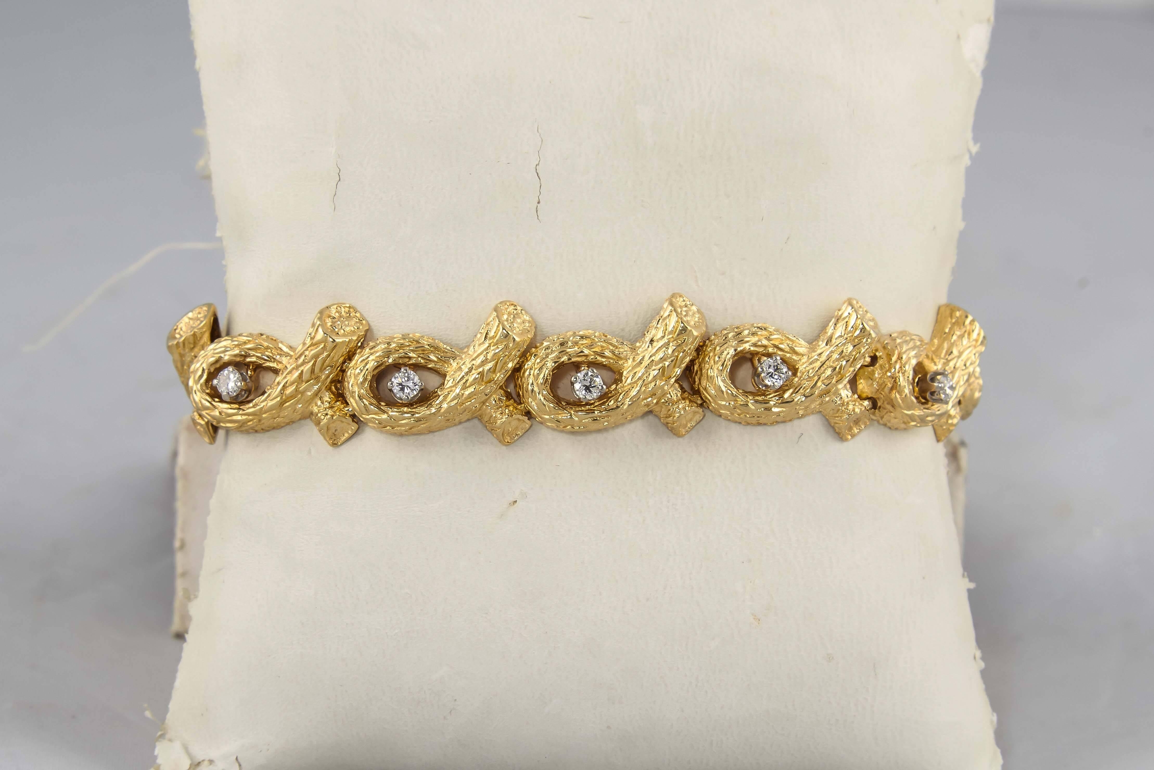 18kt Textured Yellow Gold Open Link Flexible Bracelet Exhibiting A Bamboo Style And Branch Like/Log Design Craftmanship,Embellished With Ten Full Cut High Quality Diamonds Weighing Approximately 1.10 Total Carat Weight.Designed In The 1960's By