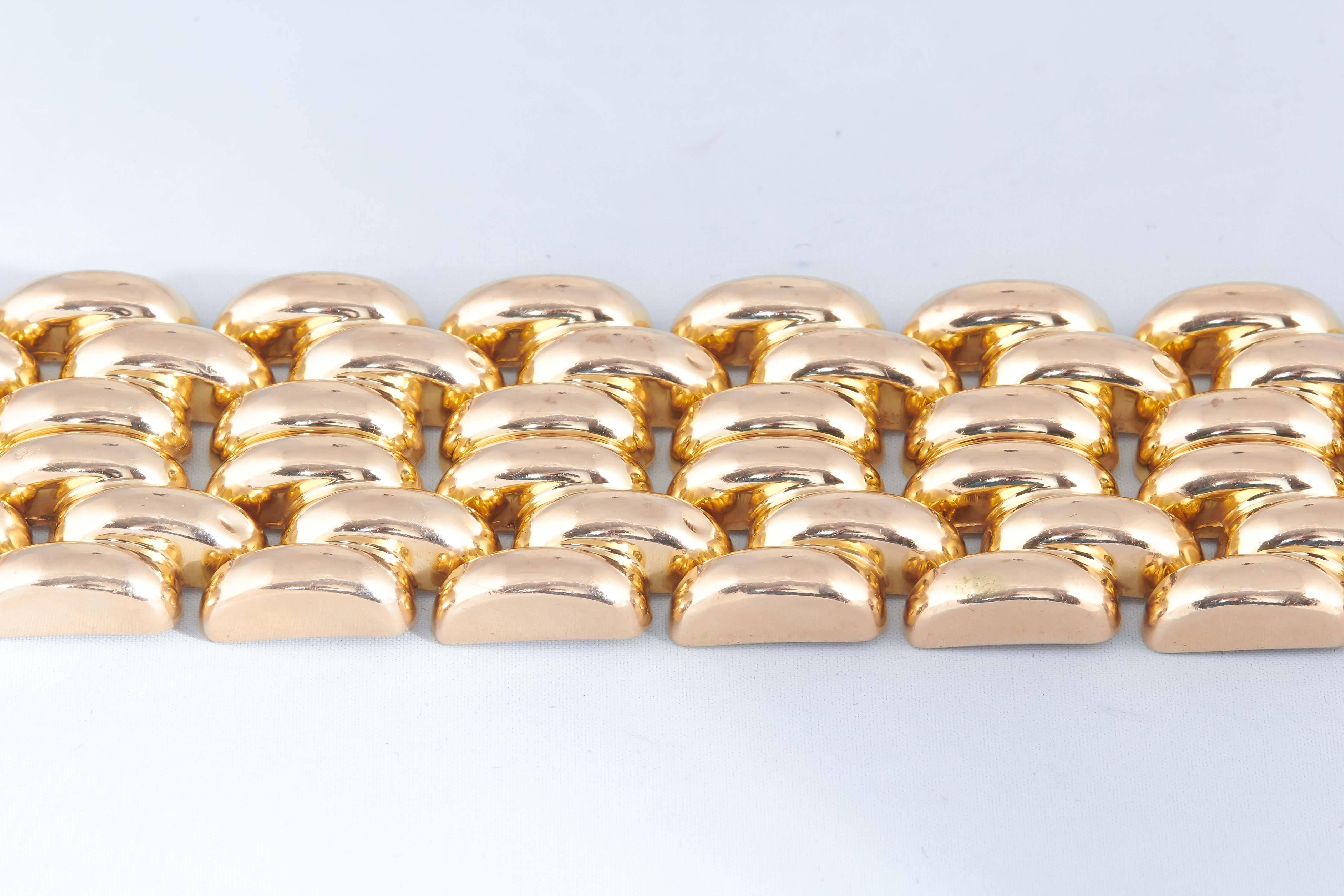 18kt Gold Six Row Link Bracelet Consisting Of A High Style Tank Design Interlocking Curbed Links With A High Polish Gold Dramatic Look. Designed In The 1950's In America.