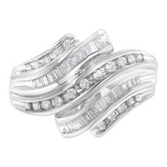 10K White Gold Round and Baguette Cut 3/4 Cttw Diamond Channel Ring