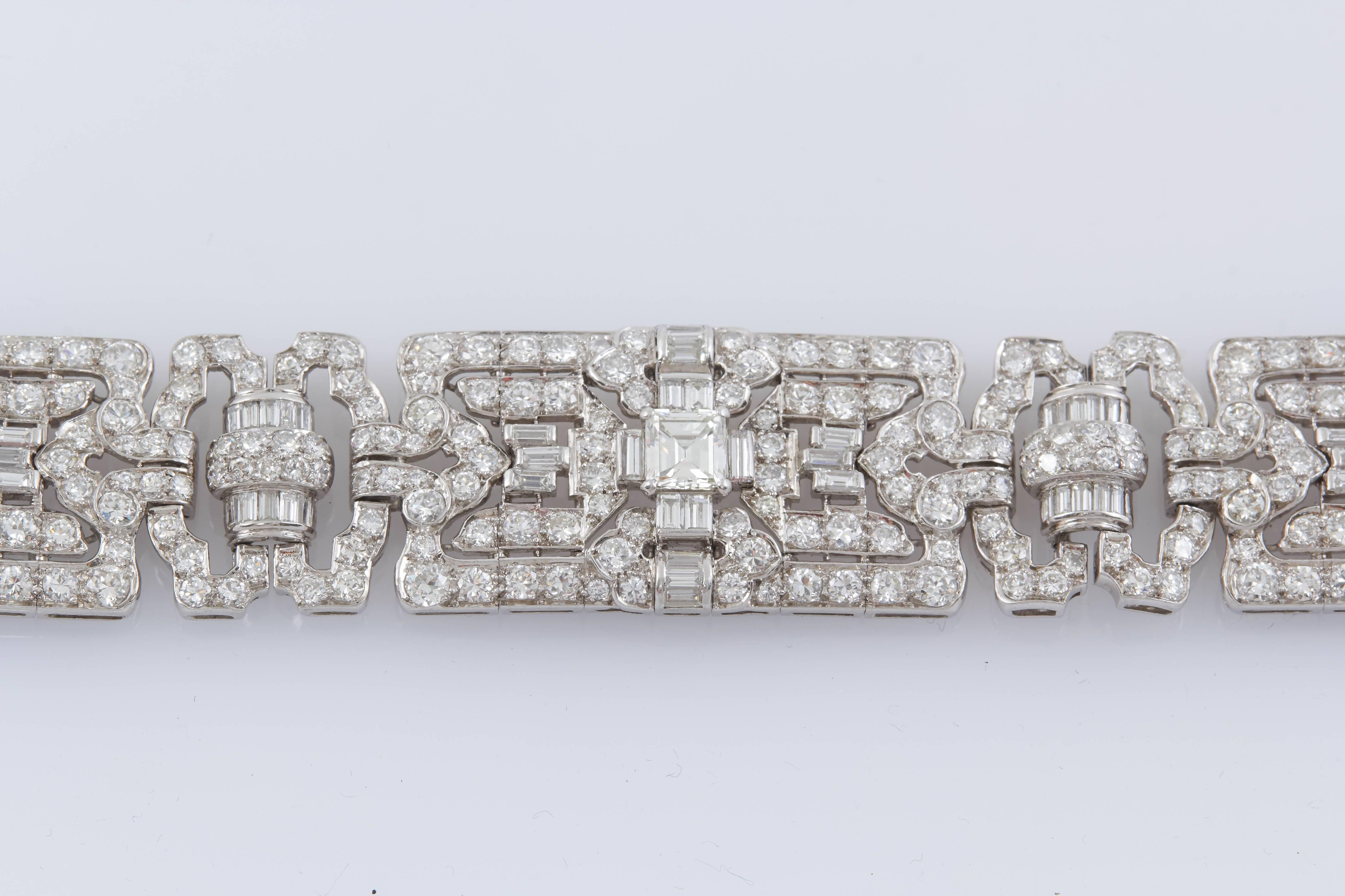 This magnificent 1930s Art Deco platinum bracelet is set with 35.00 carats of  of Asscher, Round Brilliant & Baguette cut diamonds.