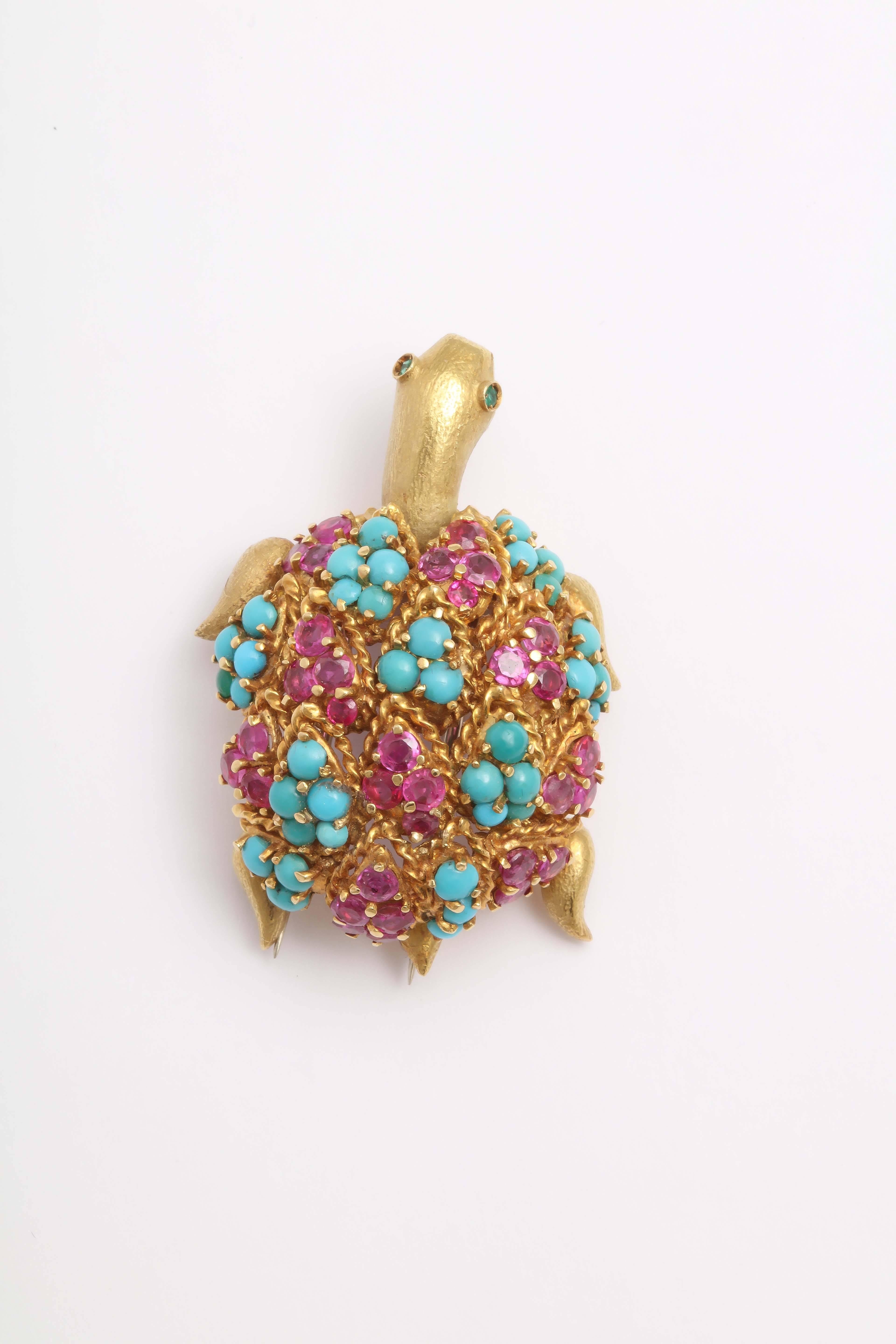 Charming  Bejeweled Turtle Brooch set with a patterned back of prong  set faceted Rubies and Turquoise round beads.
   Perfect to highlight any carefree afternoon or dress up  a very sexy evening.
Double spoke Clip.  Beautifully made - only adding