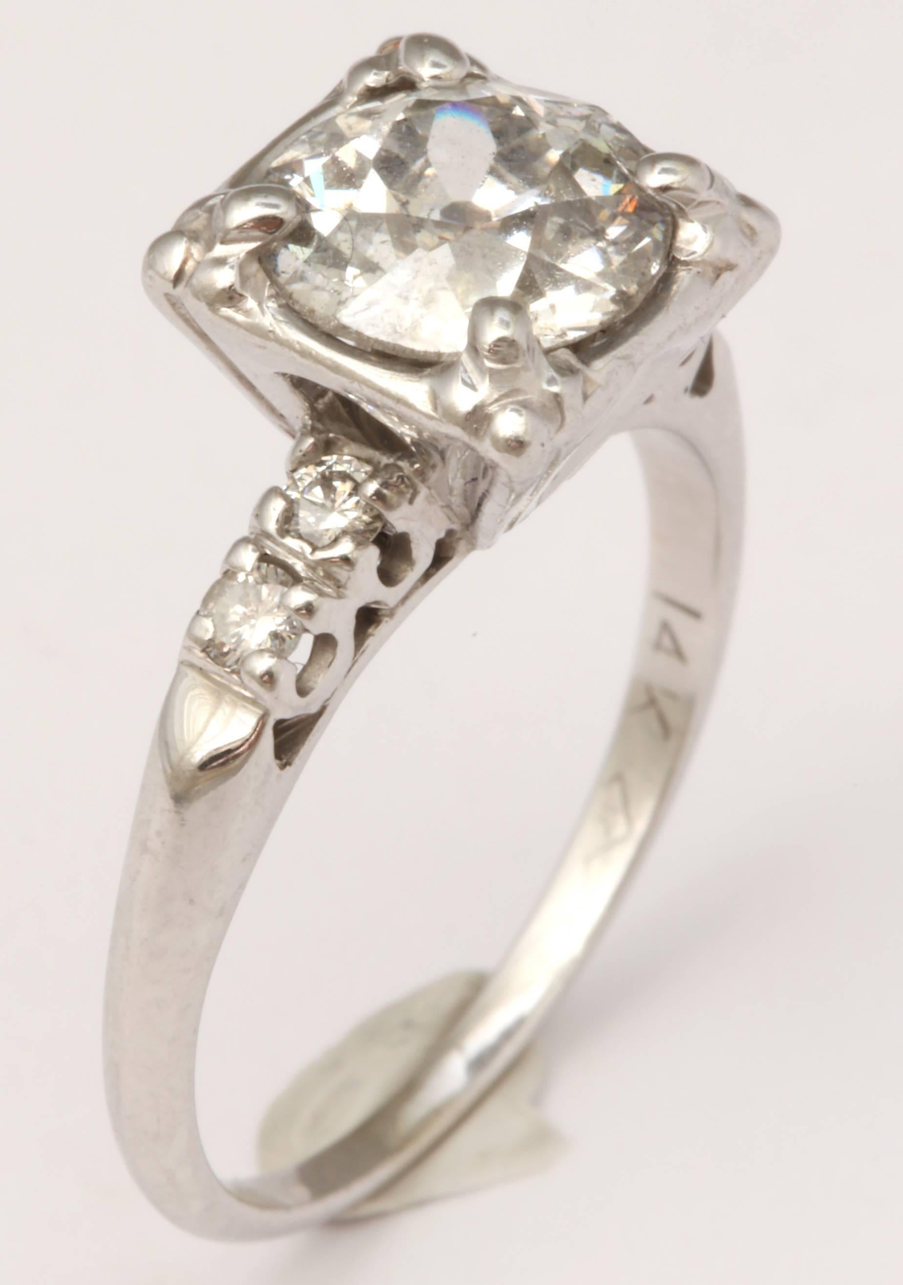 Art Deco EGL Certified 1.5 Carat Diamond White Gold Engagement Ring For Sale