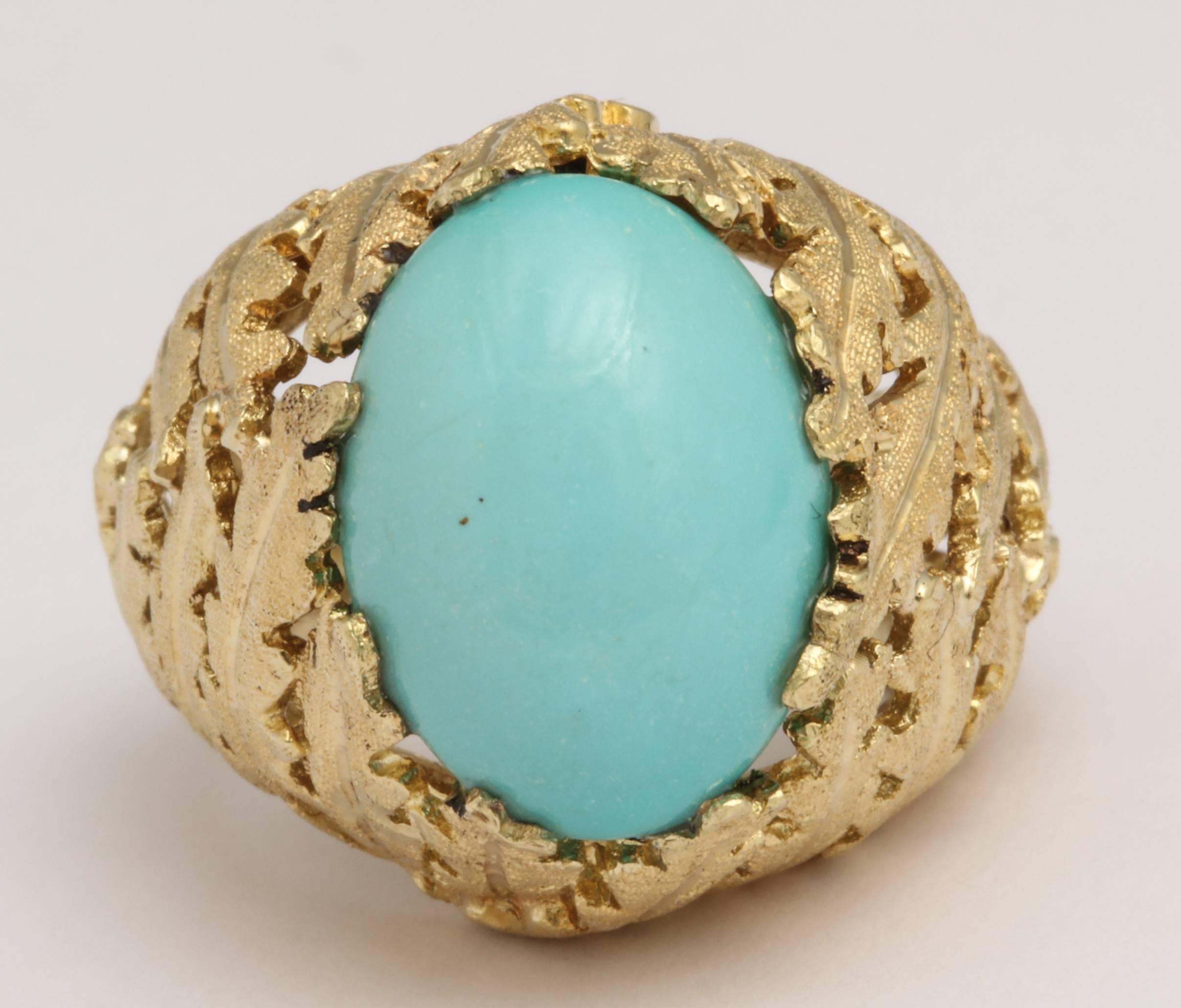 Beautiful 18kt Yellow Gold Foliate mounting set with Persian Turquoise oval cabochon stone.
  Beautifully engraved.  Size 5 but can be made larger or smaller
