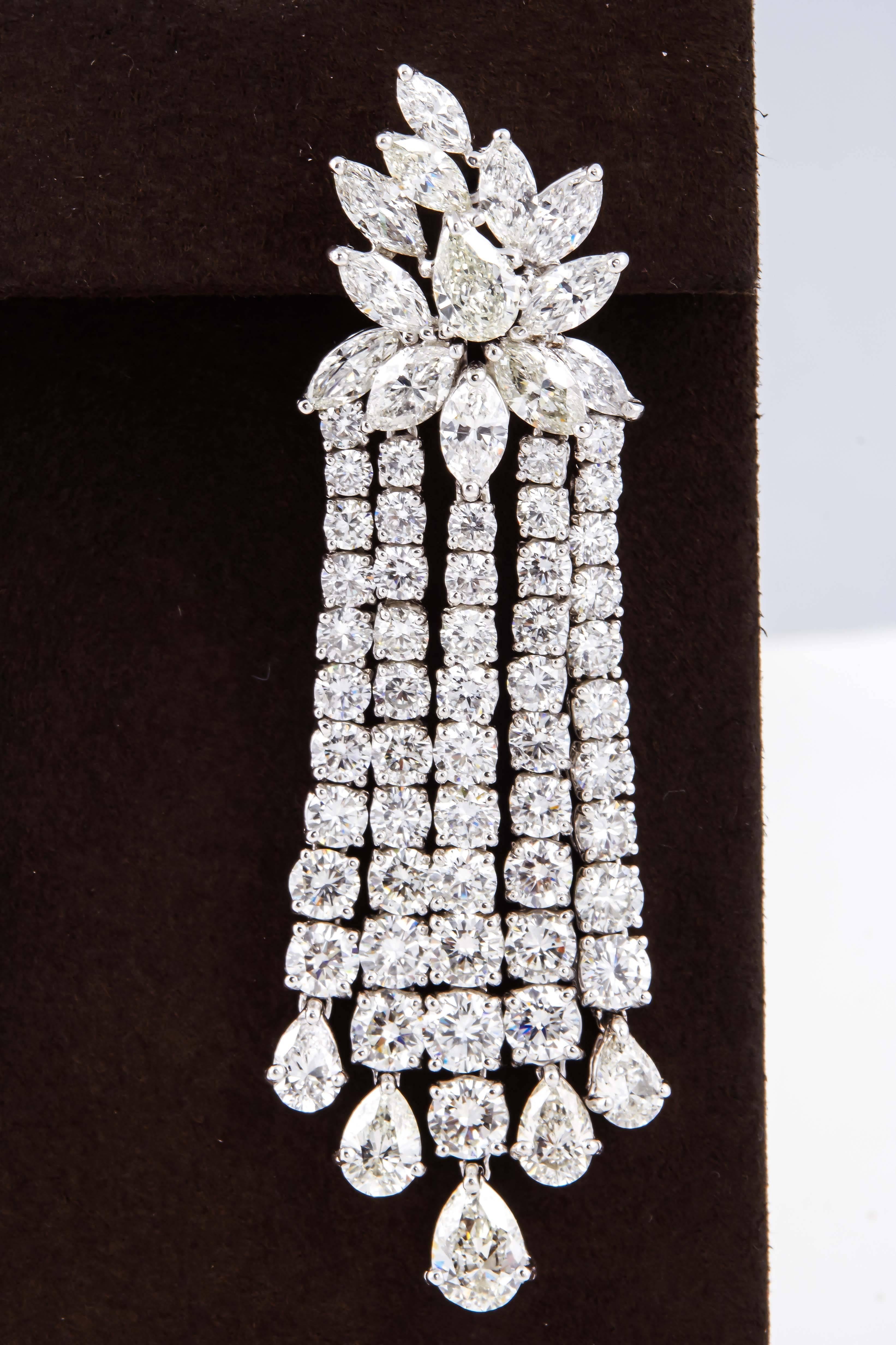 
Just under 30 carats of diamonds!

A FABULOUS pair of important diamond earrings!

29.15 carats of F/G VS diamonds set in platinum.

Approximately 2.6 inches in length.
