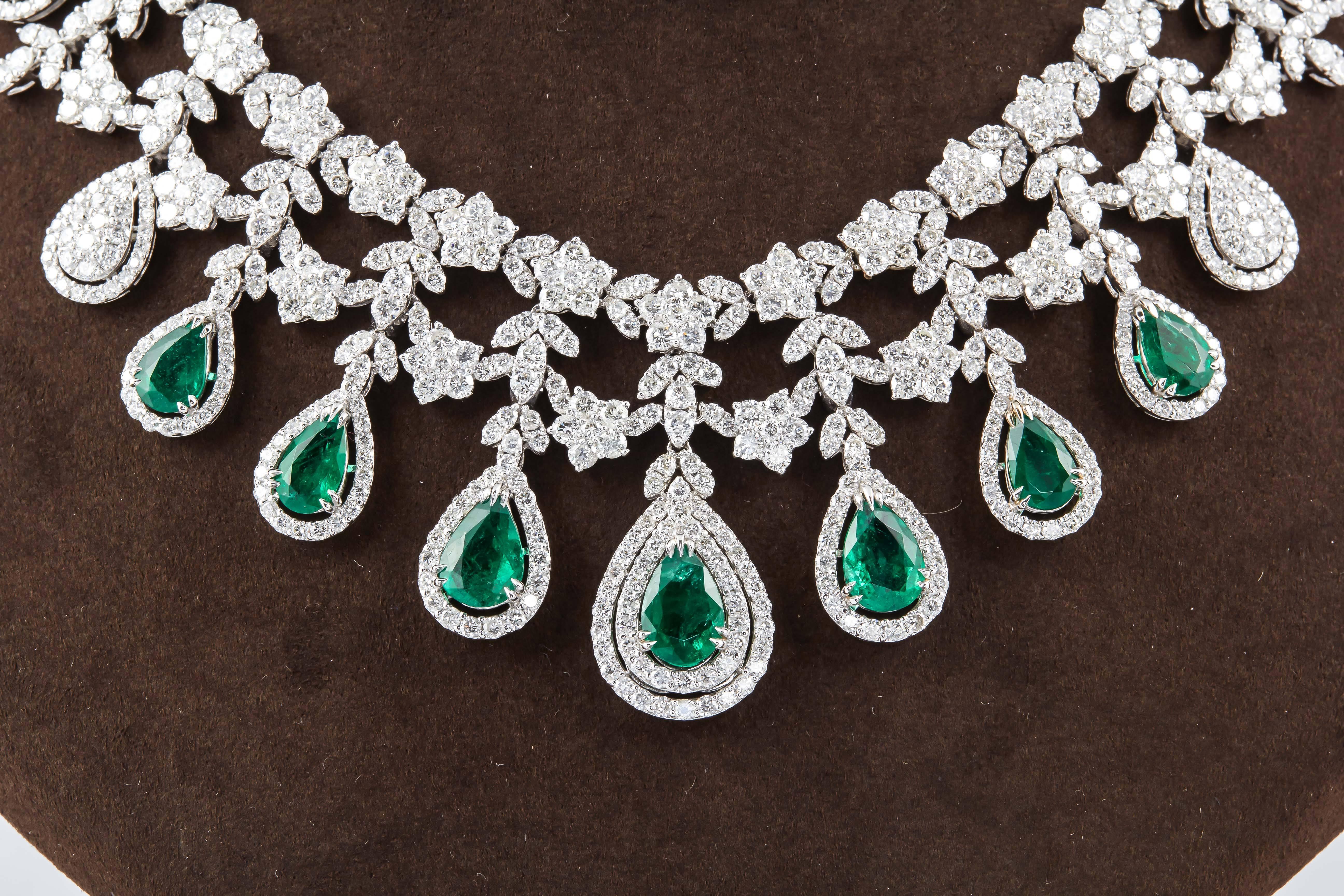 

A beautiful emerald and diamond necklace with an very important look. 

12.05 carats of fine green emeralds. 28.04 carats of round brilliant cut diamonds. 

18k white gold 

The design resembles a tiara. 

Approximately 16.5 inch length