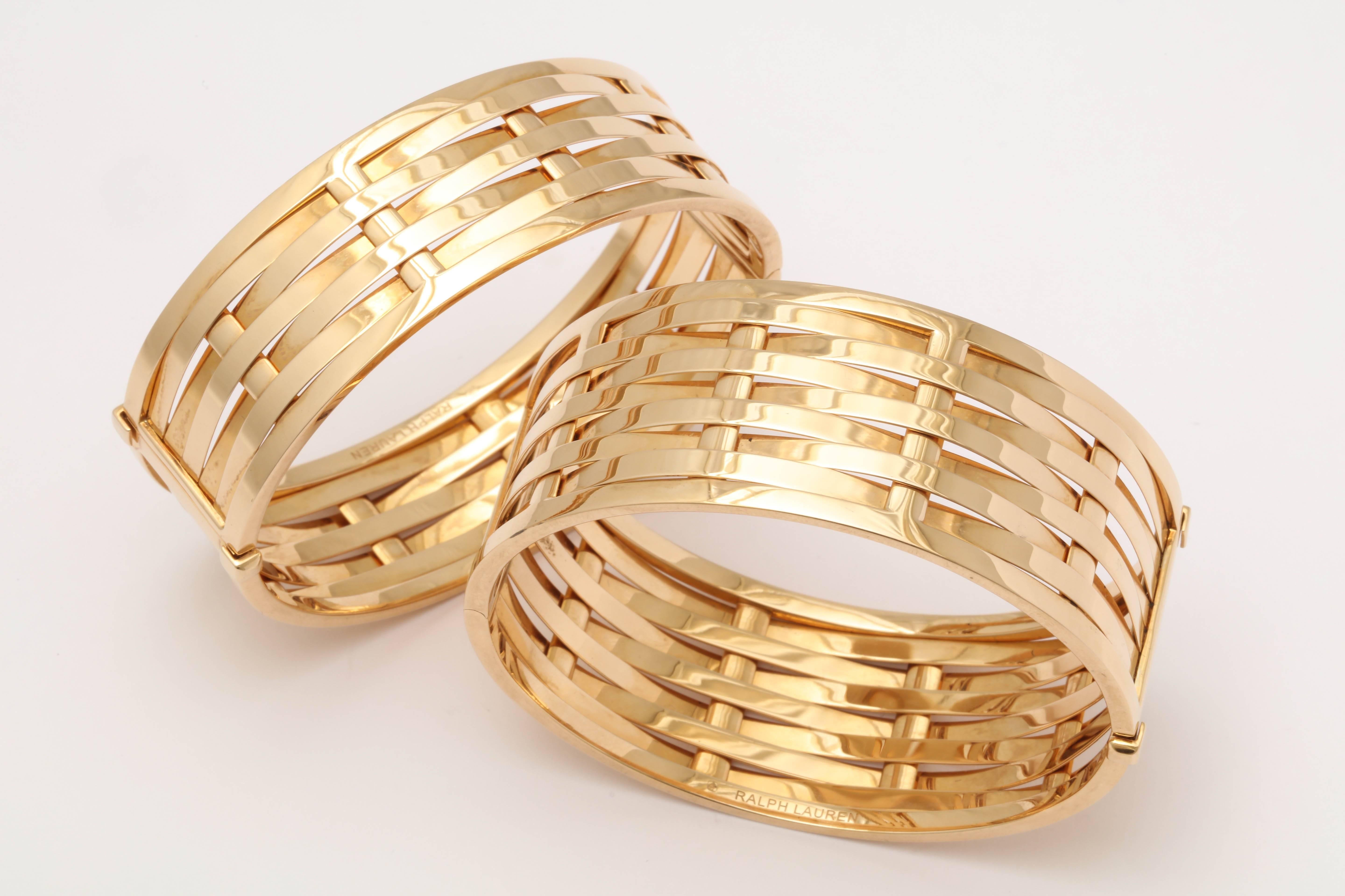 18kt Gold Pair Of High Polish Beautiful Patina Bangle Bracelets Exhibiting An Interwined Basket Weave Pattern Thruout The Design Of The Bracelets . Created By Ralph Lauren in The 1990's In America. Bracelets May Be Sold Individually Or As a