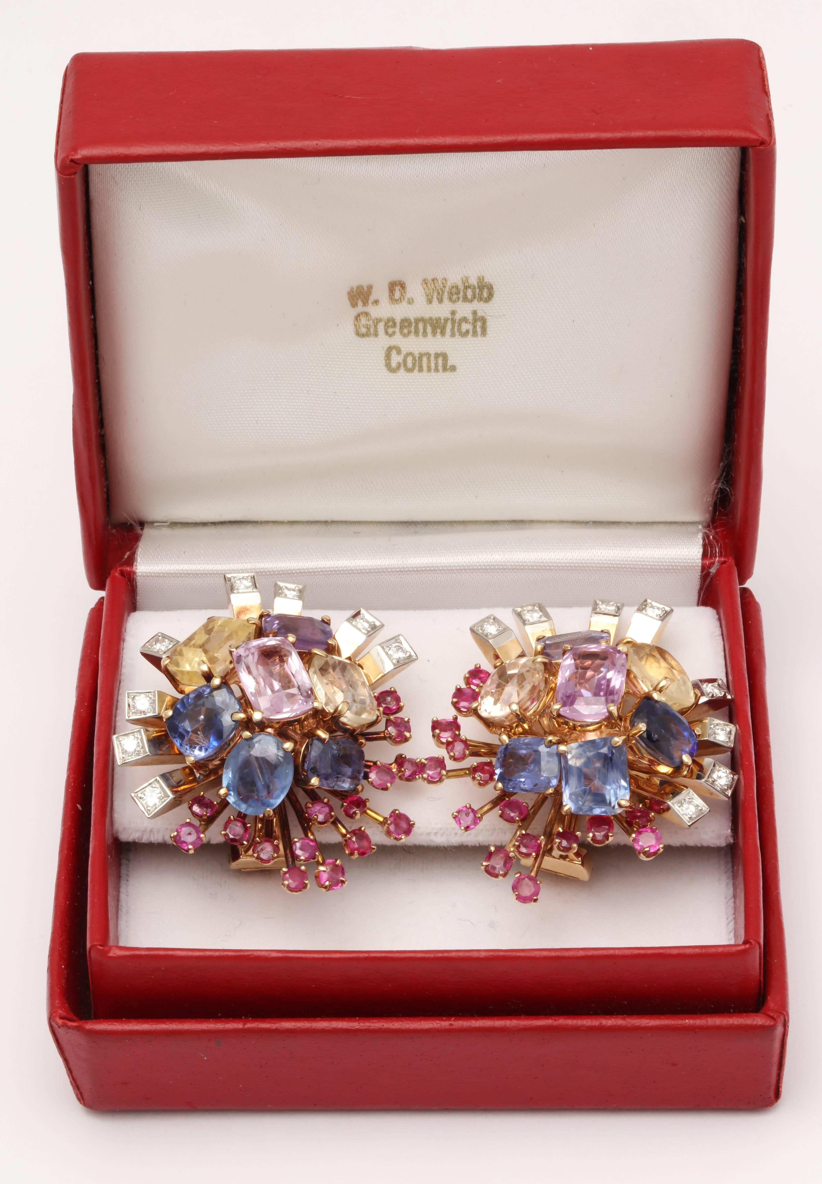 One Pair Of Ladies 14kt Yellow Gold American Made Floral Bouquet Spray Style Earclips Embellished With Pink ,Yellow Purple And Blue Faceted Cut Sapphires Weighing Approximately 35 Carats Total Weight.Further Designed With Faceted Cut Rubies And Full