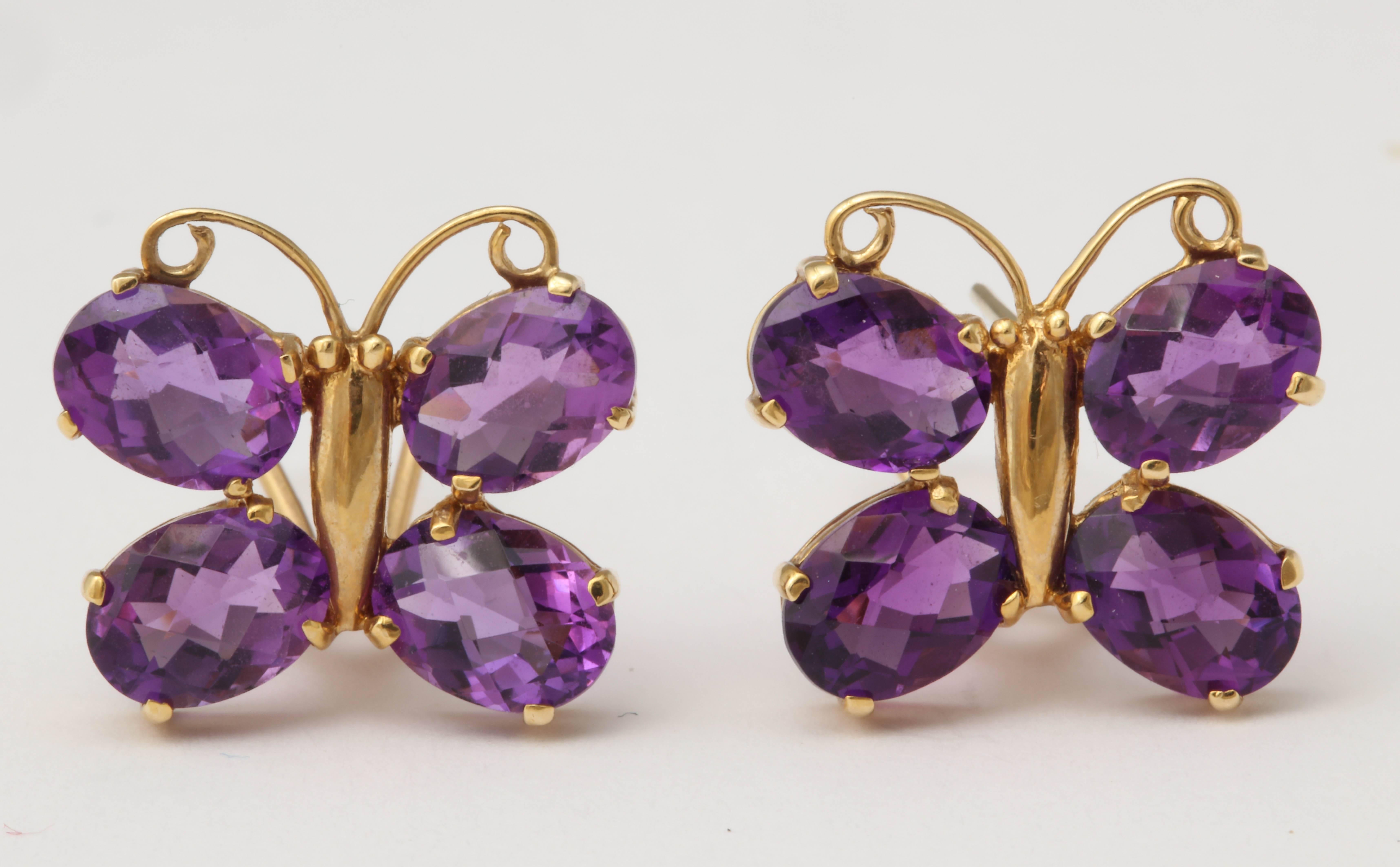 Each earrings is composed of 4 matching faceted oval amethysts around a 14 kt gold body and antennae. There is a post and a clip for security and stability.
These earrings match ring # j6961703062505783fs