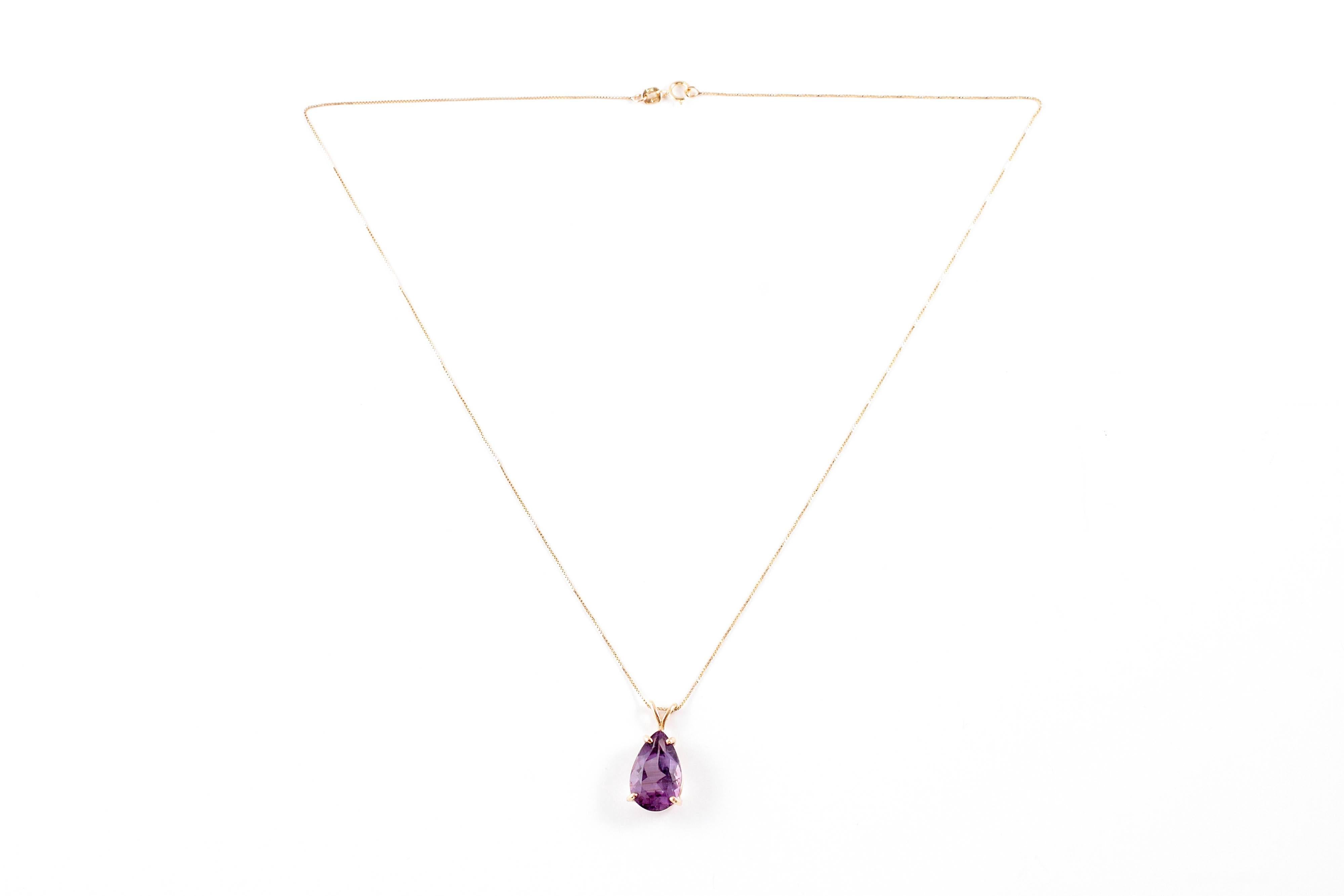 Lovely chain suspending one pear-shaped amethyst with an estimated weight of 5.60 carats.  The chain is 18 inches in length