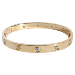 Cartier Love-Armband, 10 Diamanten (Gelbgold)