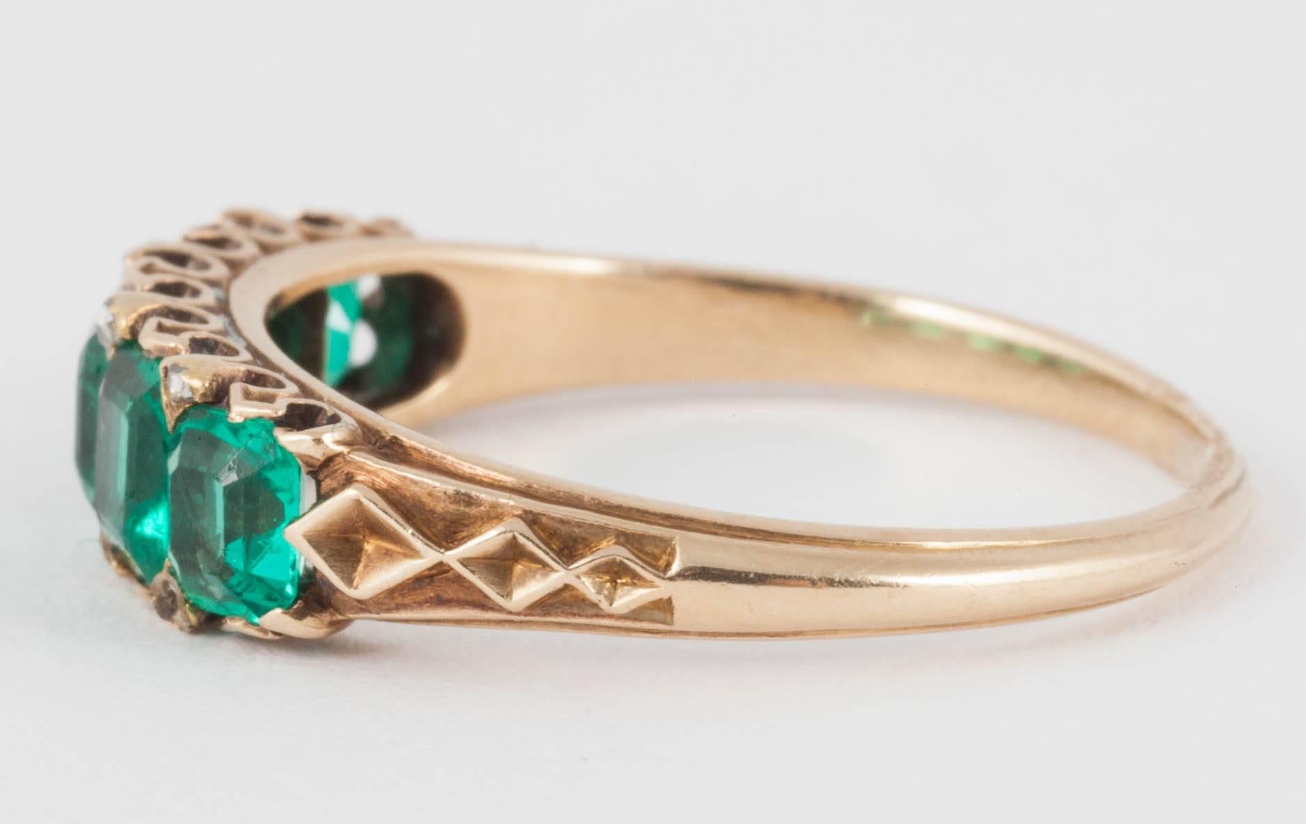 Late Victorian Ring, 19th Century Emerald and Gold Carved Half Hoop , circa 1880
