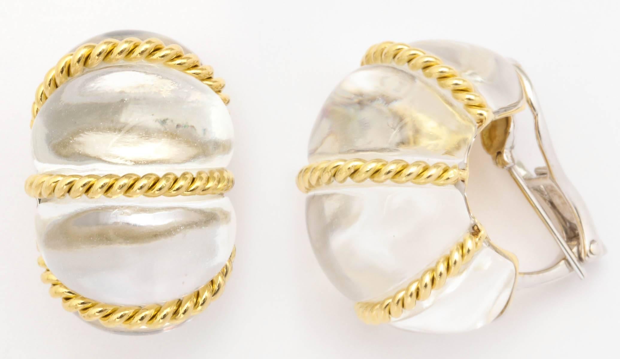 18k yellow & white gold rock crystal shrimp design earrings
adjustable post/clip closure