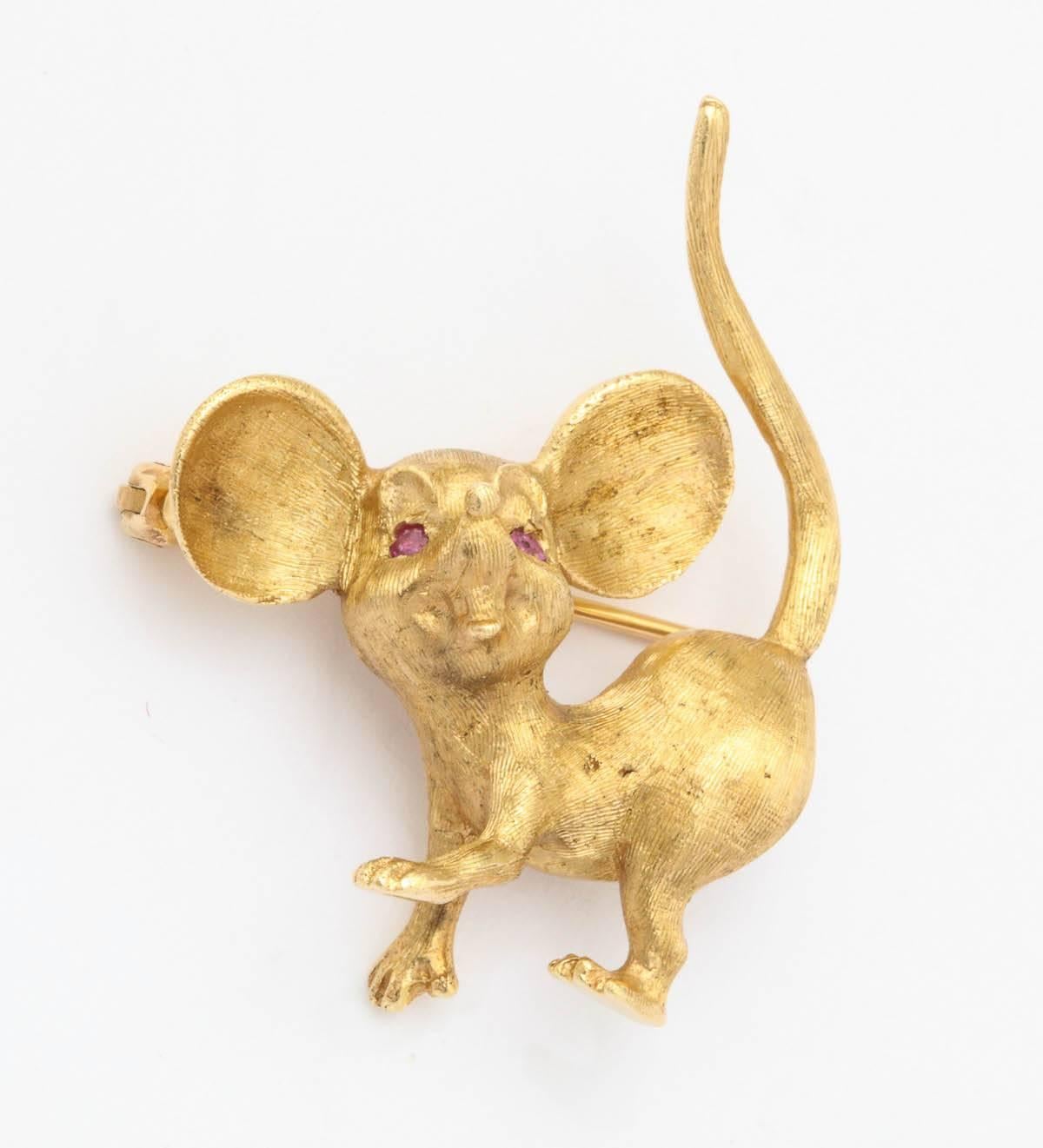 brass mouse with glasses