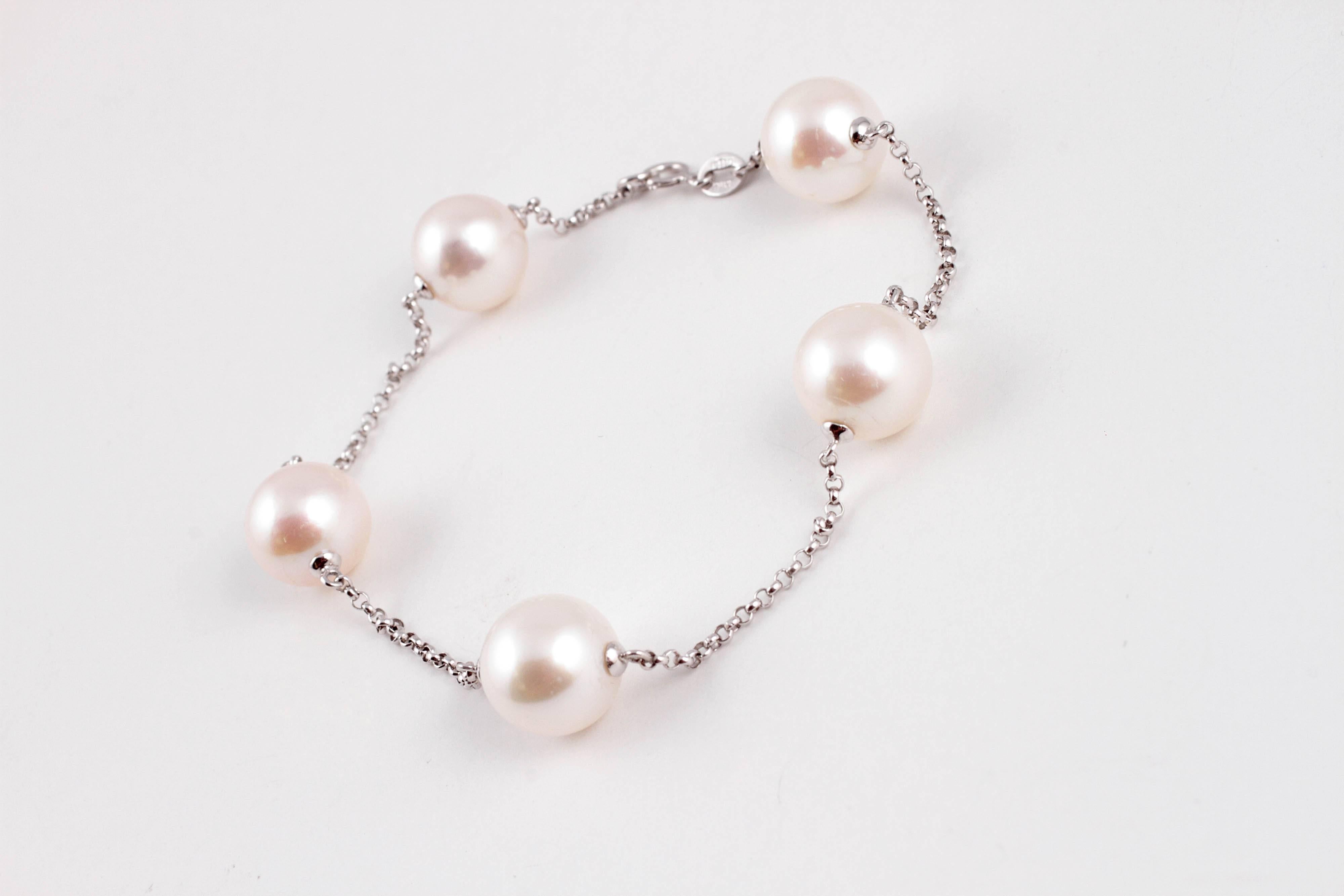 Mastoloni 11.00 mm South Sea cultured pearls stationed on a 8.75 inch 14 karat white gold bracelet.  