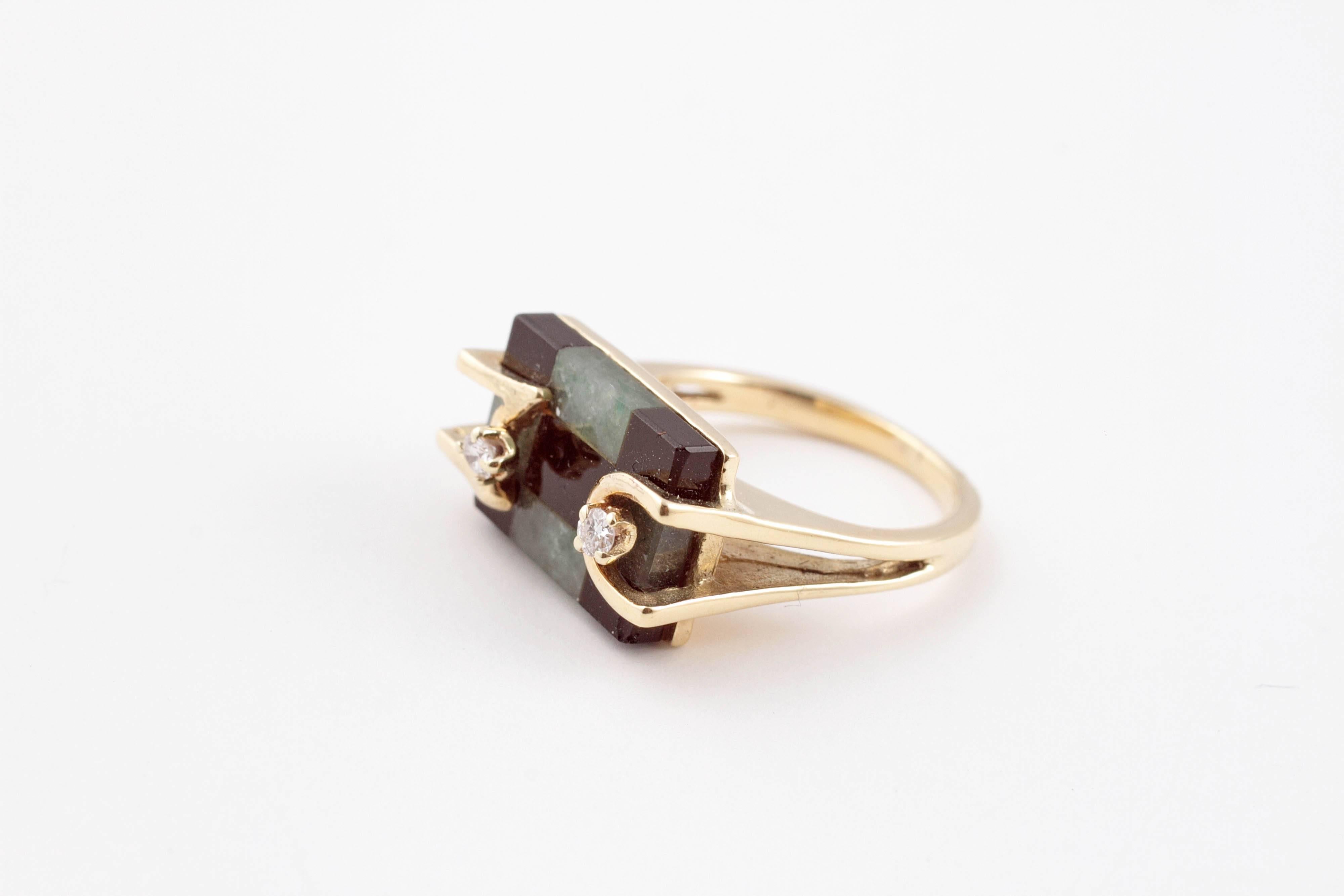 So unusual and different!  in 14 karat yellow gold, with black and greenish hardstones and accent diamonds.  Size 5.