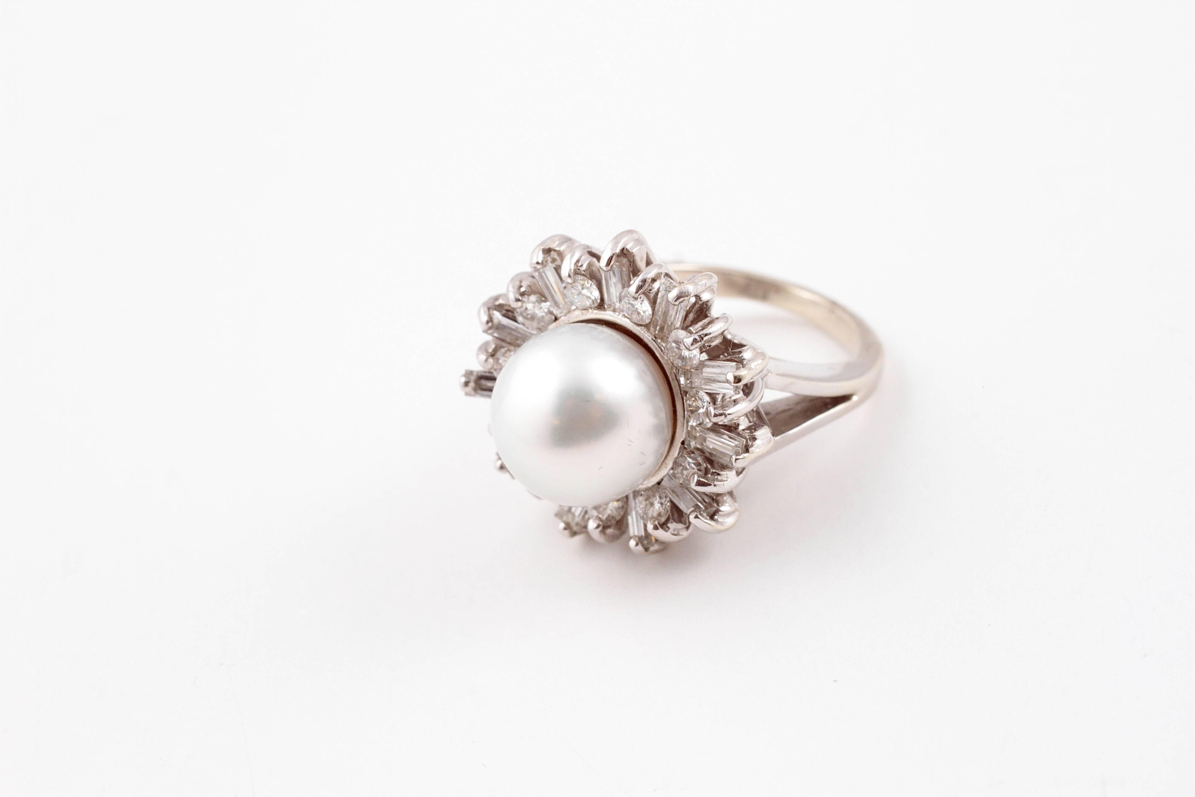 Lustrous 11.3 millimeter South Sea pearl with 1.60 carats of diamonds set in 14 karat white gold.  Size 6 1/4.