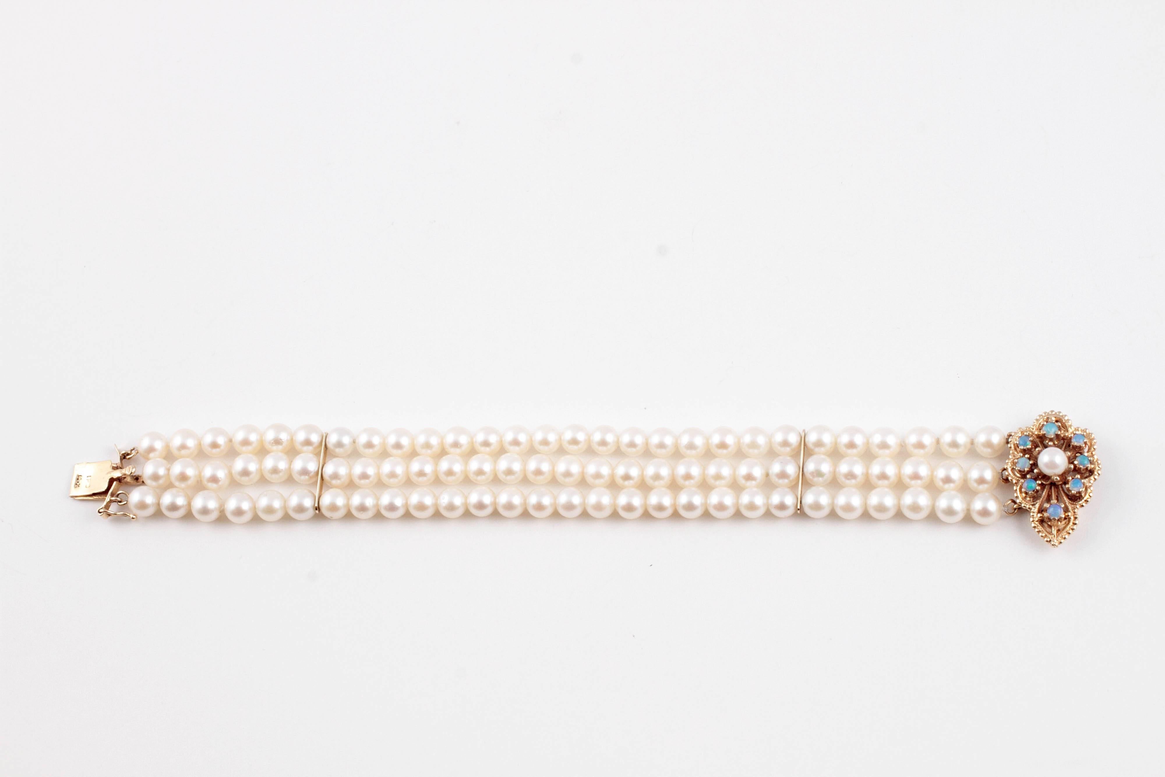 Cultured Pearl Three Strand Yellow Gold Bracelet with Opal Clasp In Excellent Condition In Dallas, TX