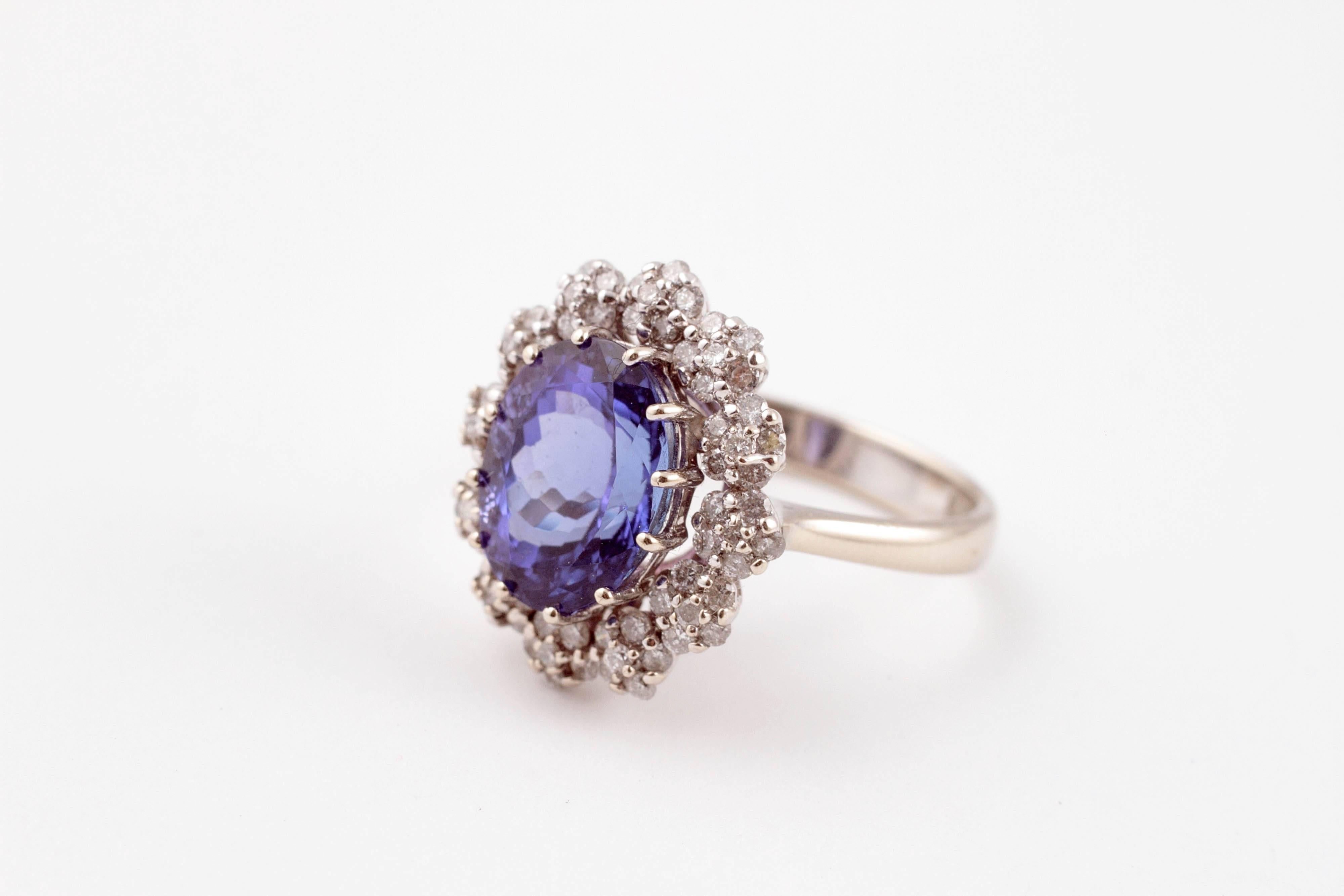 If you love violet - blue stones, this one is for you! In 14 karat white gold. Size 7