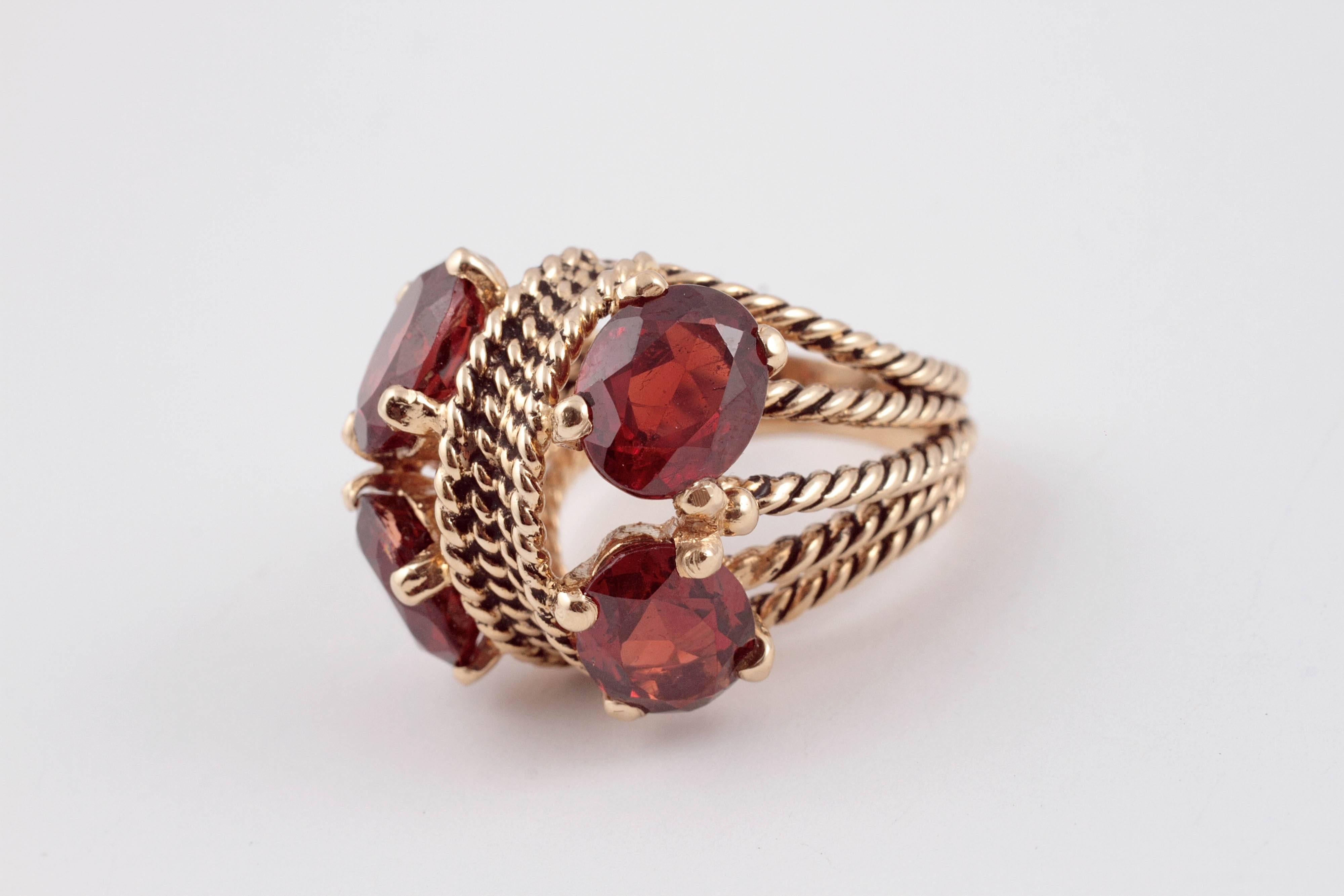 Lovely garnet and 14 karat yellow gold ring, Size 8