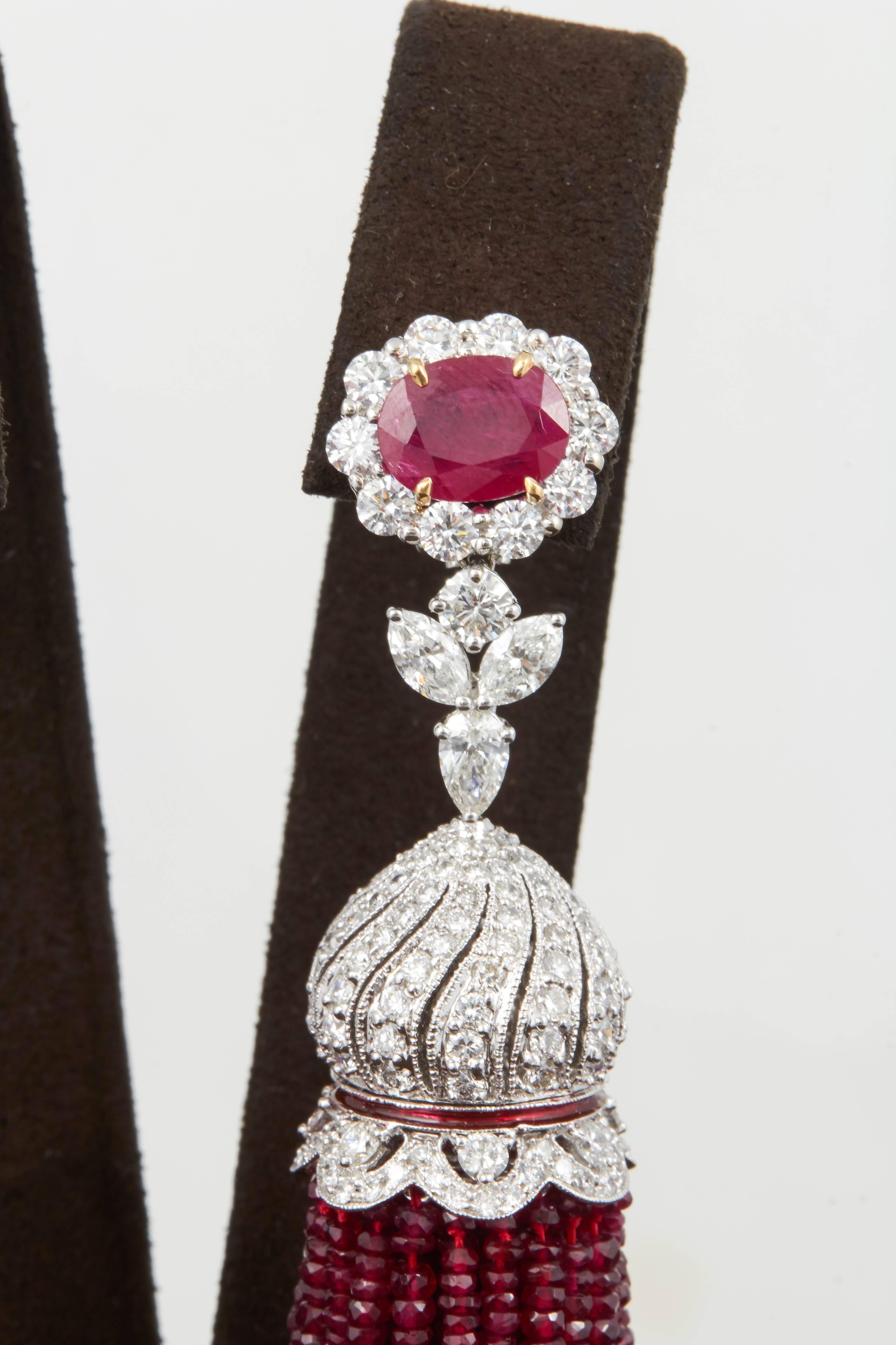 
Fabulous statement earrings! 

Over 500 carats of fine ruby! 13.85 carats of diamonds!

4.5 inches in length 

18k white gold 

A one of a kind earring that can be worn casually or to a black tie affair. 