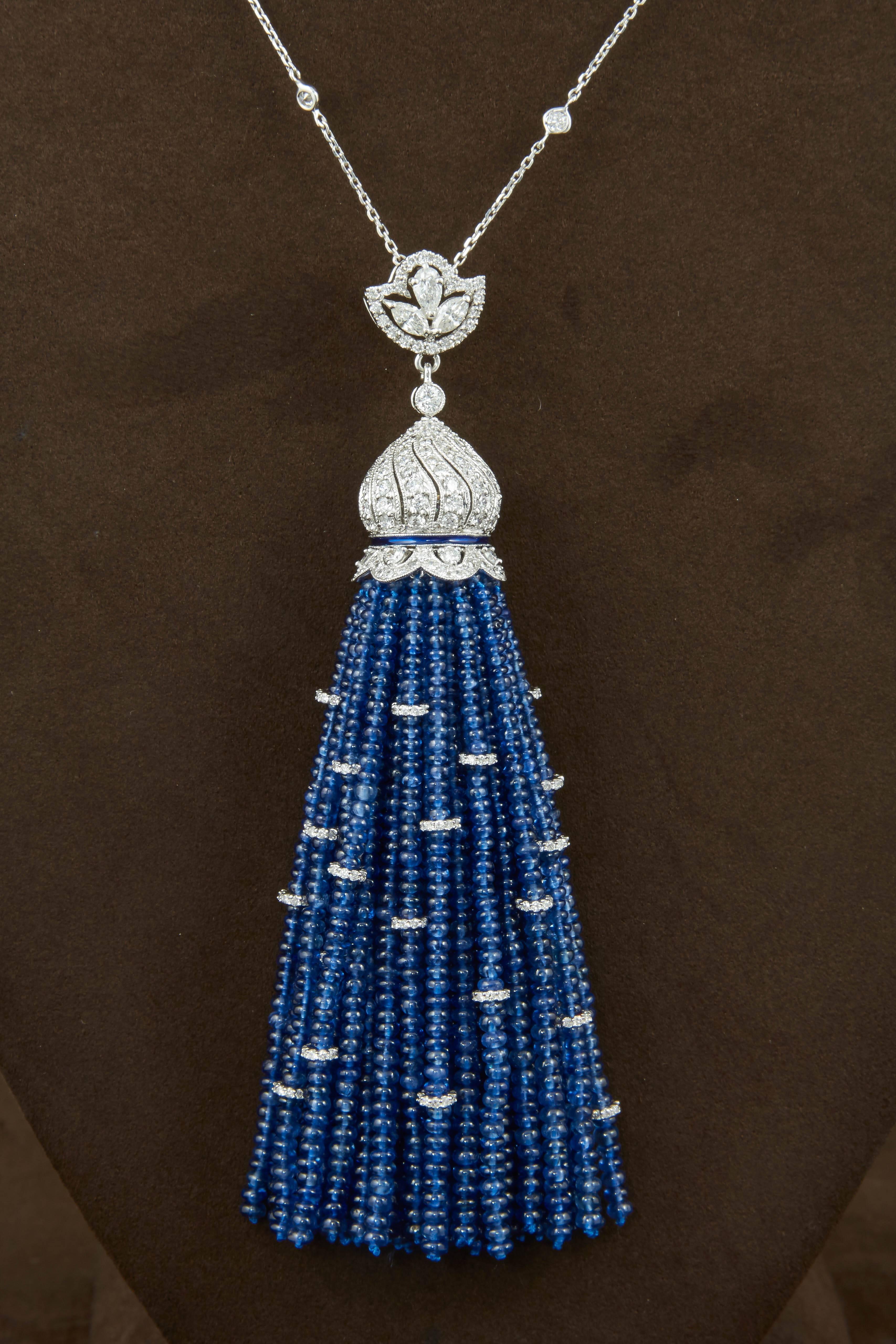 

A stunning piece!

Over 200 carats of fine sapphire!

7.85 carats of G/VS diamonds

18k white gold

The tassel piece measures approximately 4.4 inches long and it hangs from a 32 inch diamond by yard chain. The diamond by yard chain is removable