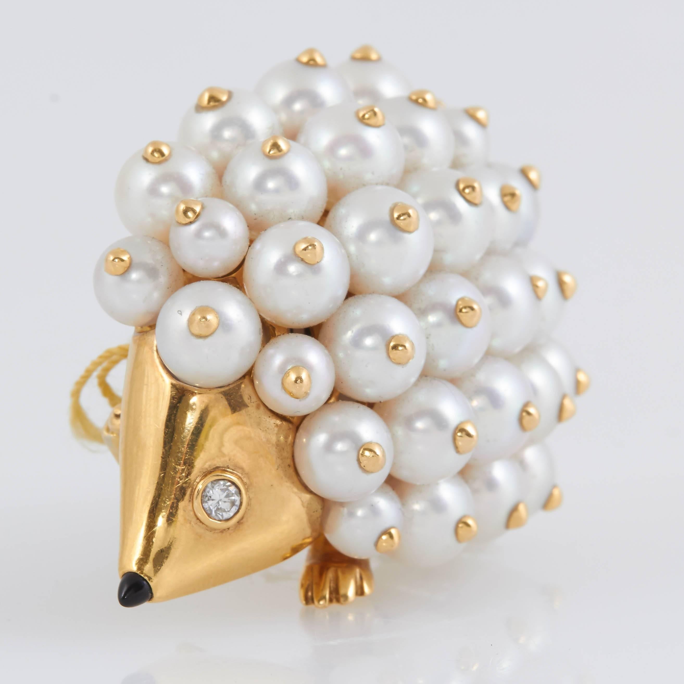 Charming Chanel Porcupine Pin finely crafted in 18K yellow gold with pearl body.