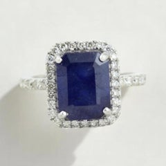 Anello con zaffiro blu e diamante aureolato in oro massiccio 14k (certificato)