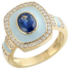 Anello con zaffiro blu di Ceylon, diamanti e smalto in oro giallo 14k