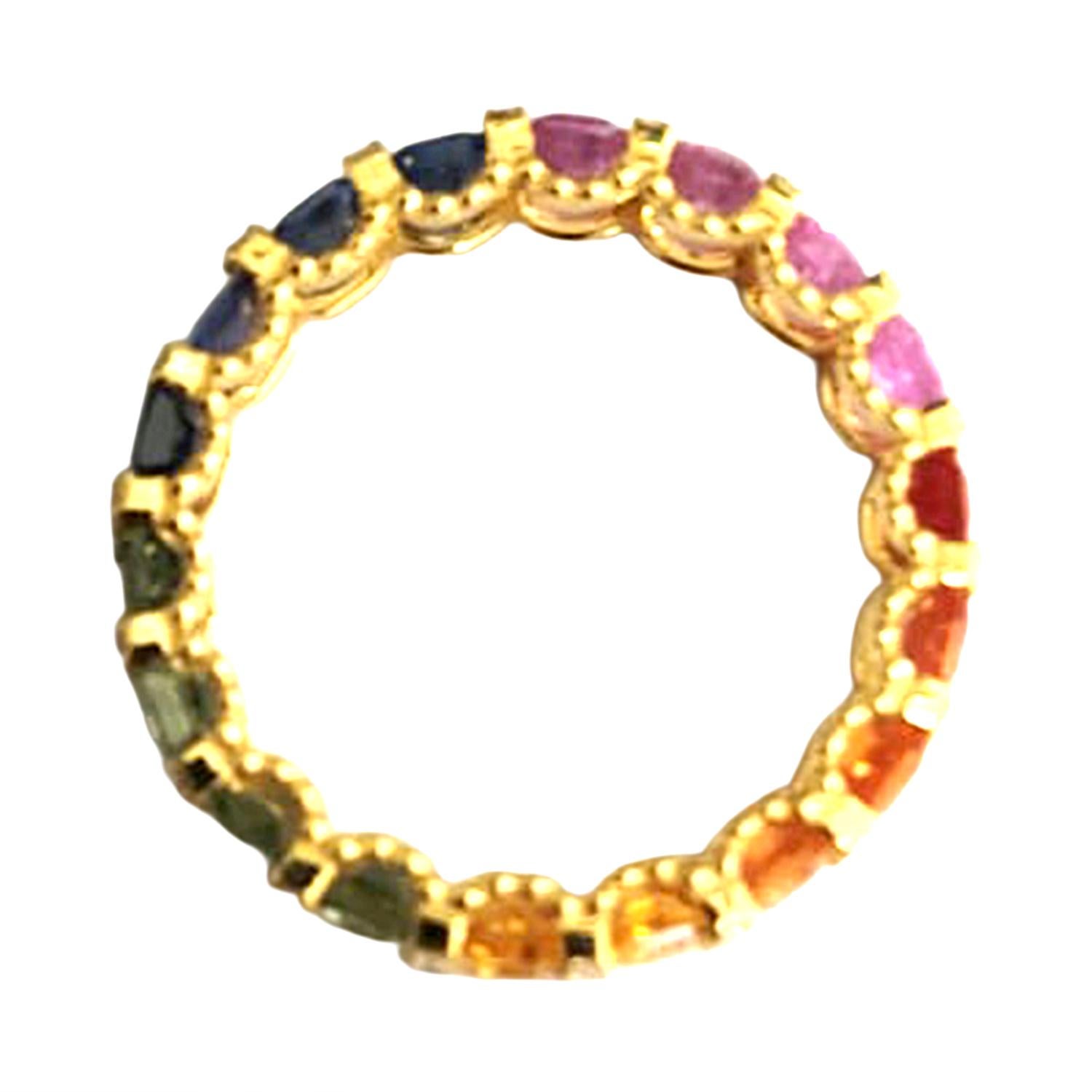Art déco Bague d'éternité en or jaune 18k avec saphirs multiples et diamants en vente