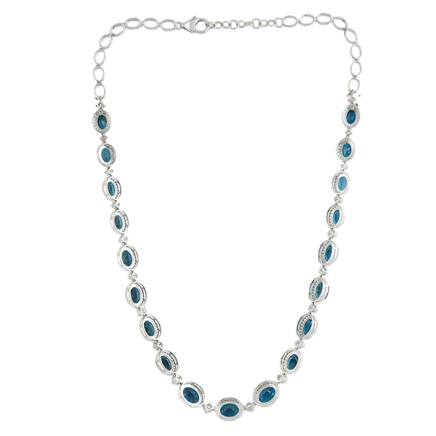 Art Déco Collana di topazio blu ovale con diamanti in oro bianco 14 carati in vendita