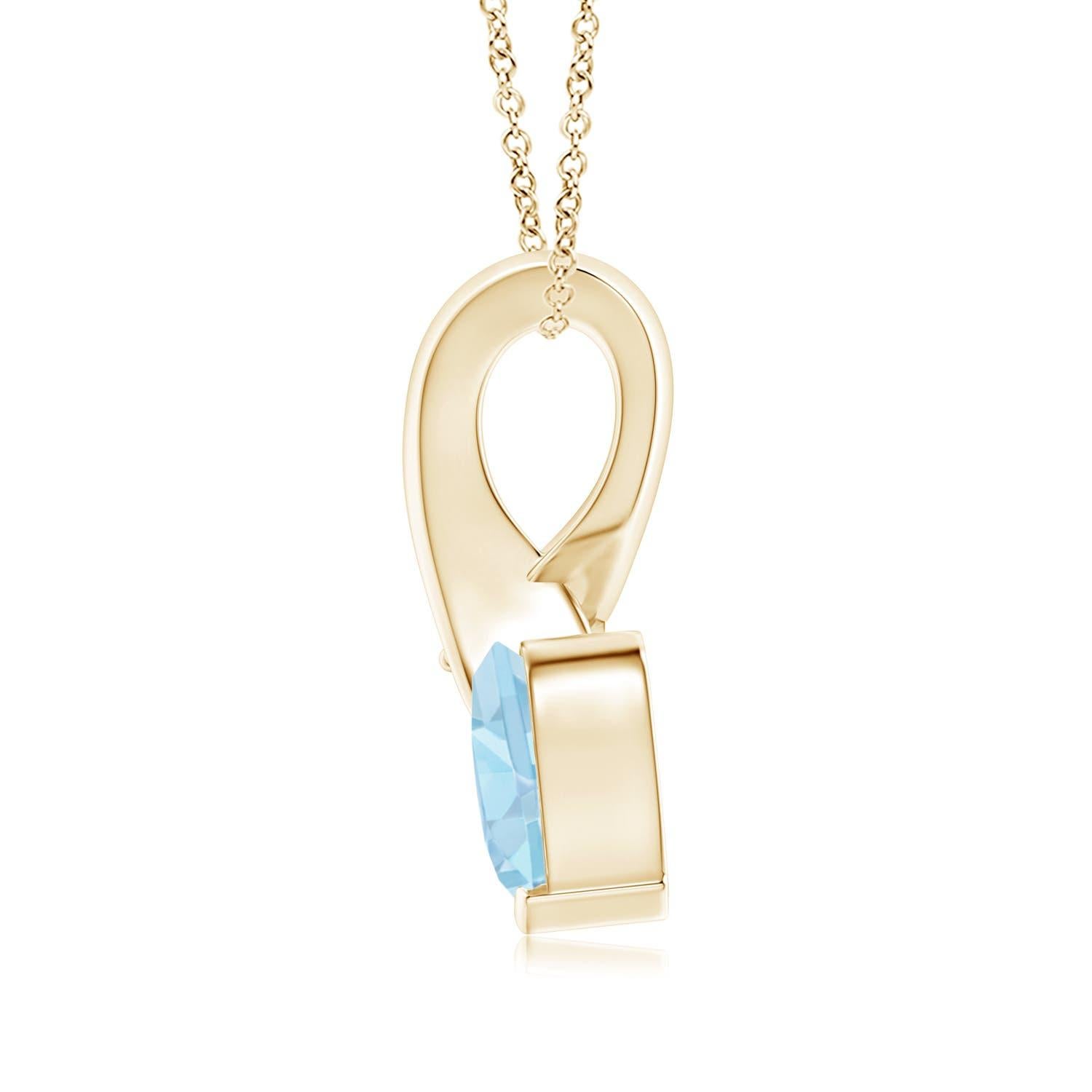 Une aigue-marine en forme de cœur est sertie en or jaune 14k. Un diamant scintillant orne l'extrémité de la balle torsadée, rehaussant ainsi sa teinte bleue glaciale. Le diamant confère un effet charmant à cet adorable pendentif en forme de cœur en