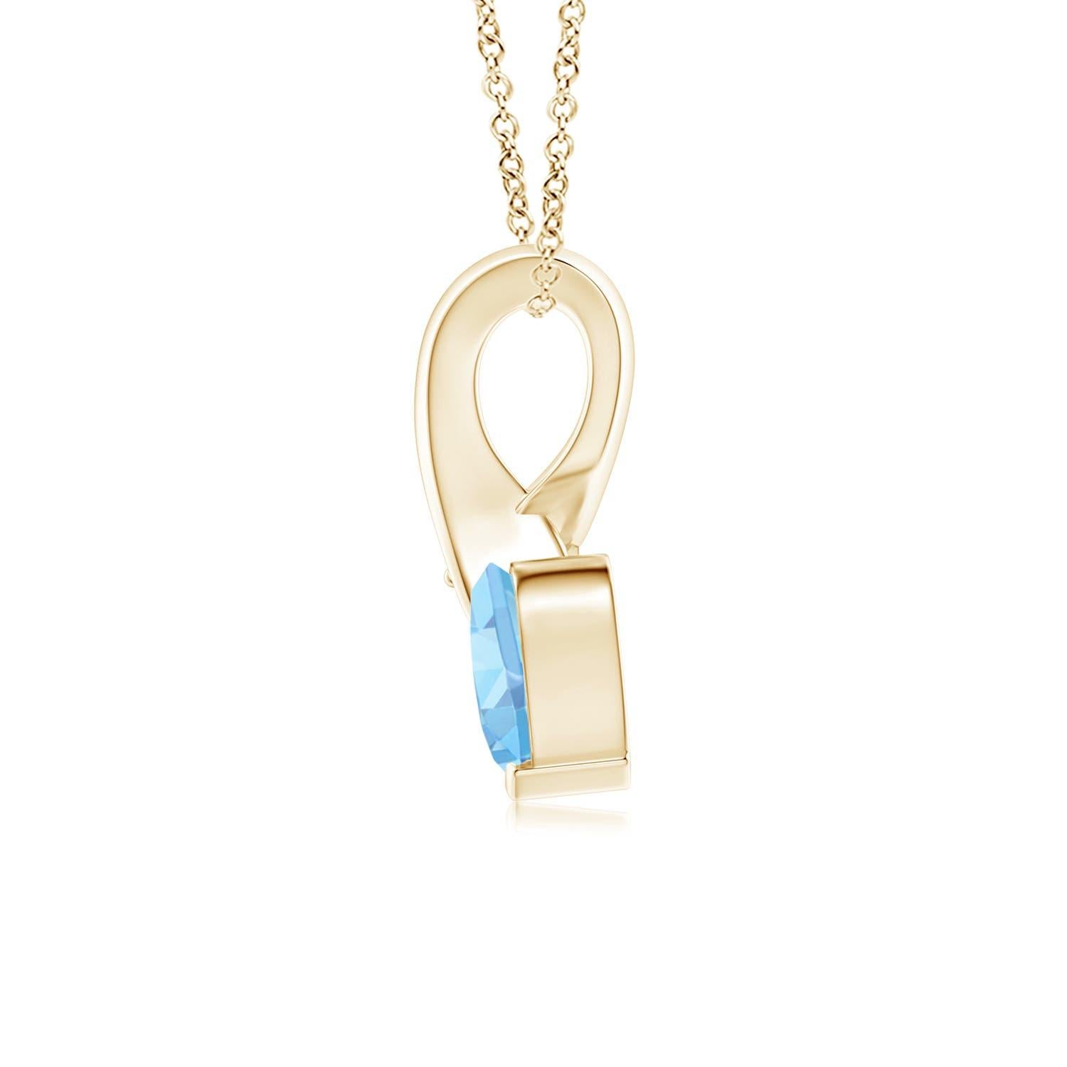 Une aigue-marine en forme de cœur est sertie en or jaune 14k. Un diamant scintillant orne l'extrémité de la balle torsadée, rehaussant ainsi sa teinte bleue glaciale. Le diamant confère un effet charmant à cet adorable pendentif en forme de cœur en