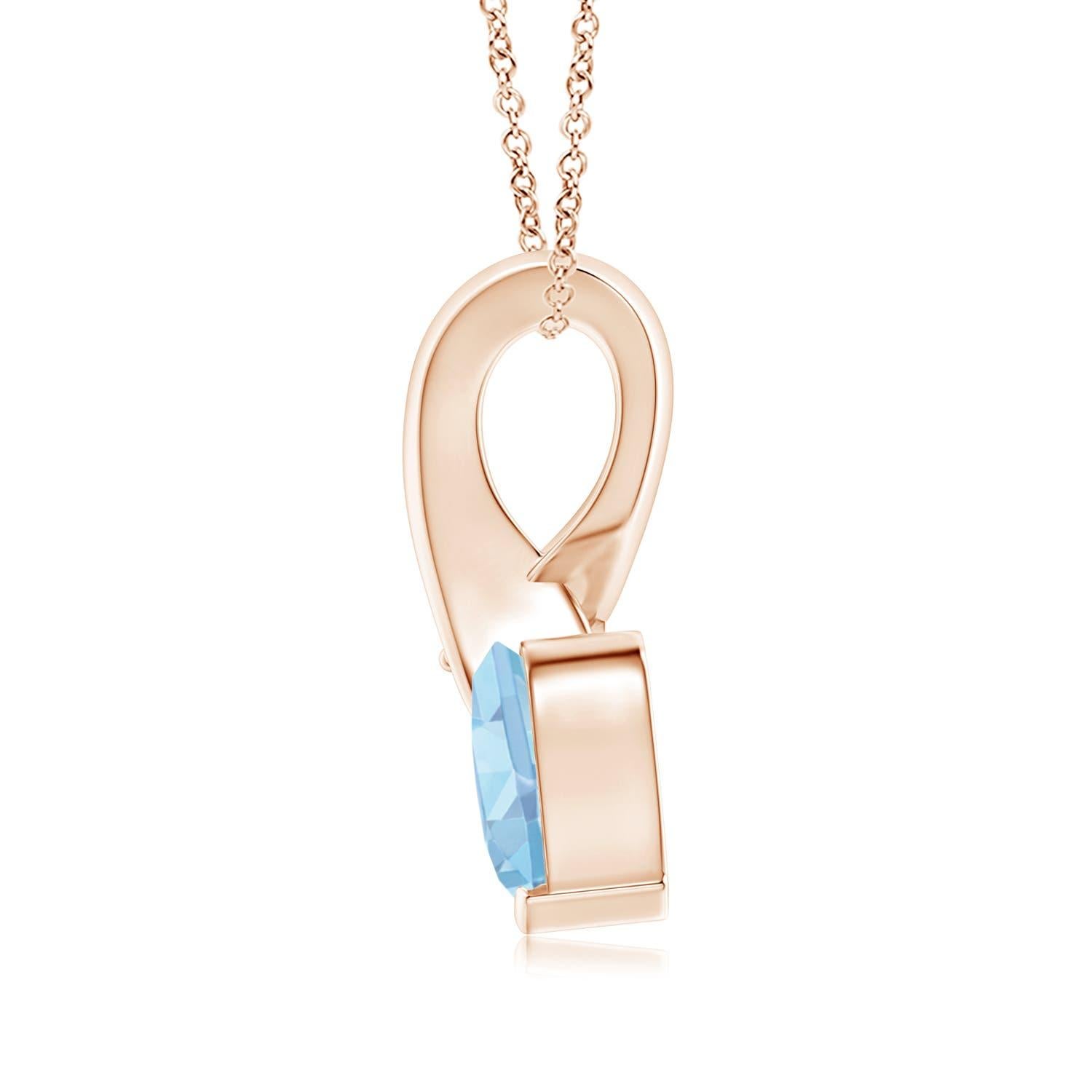 Une aigue-marine en forme de cœur est sertie en or rose 14k. Un diamant scintillant orne l'extrémité de la balle torsadée, rehaussant ainsi sa teinte bleue glaciale. Le diamant confère un effet charmant à cet adorable pendentif en forme de cœur en