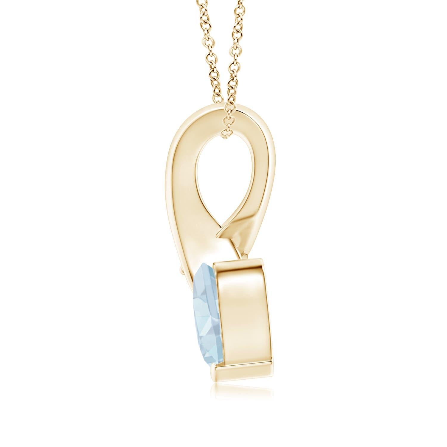 Une aigue-marine en forme de cœur est sertie en or jaune 14k. Un diamant scintillant orne l'extrémité de la balle torsadée, rehaussant ainsi sa teinte bleue glaciale. Le diamant confère un effet charmant à cet adorable pendentif en forme de cœur en