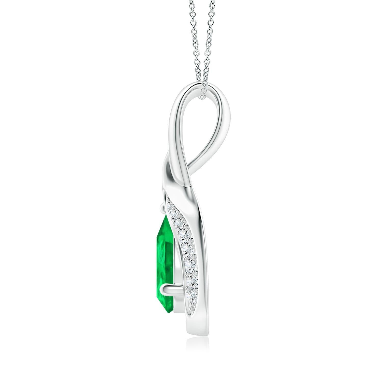 Lo smeraldo a forma di pera è incorniciato da un bellissimo anello di metallo lucido a forma di goccia. Scintillanti diamanti incastonati ornano la curva per un bordo scintillante. Questo splendido ciondolo con smeraldo e diamante in argento ti