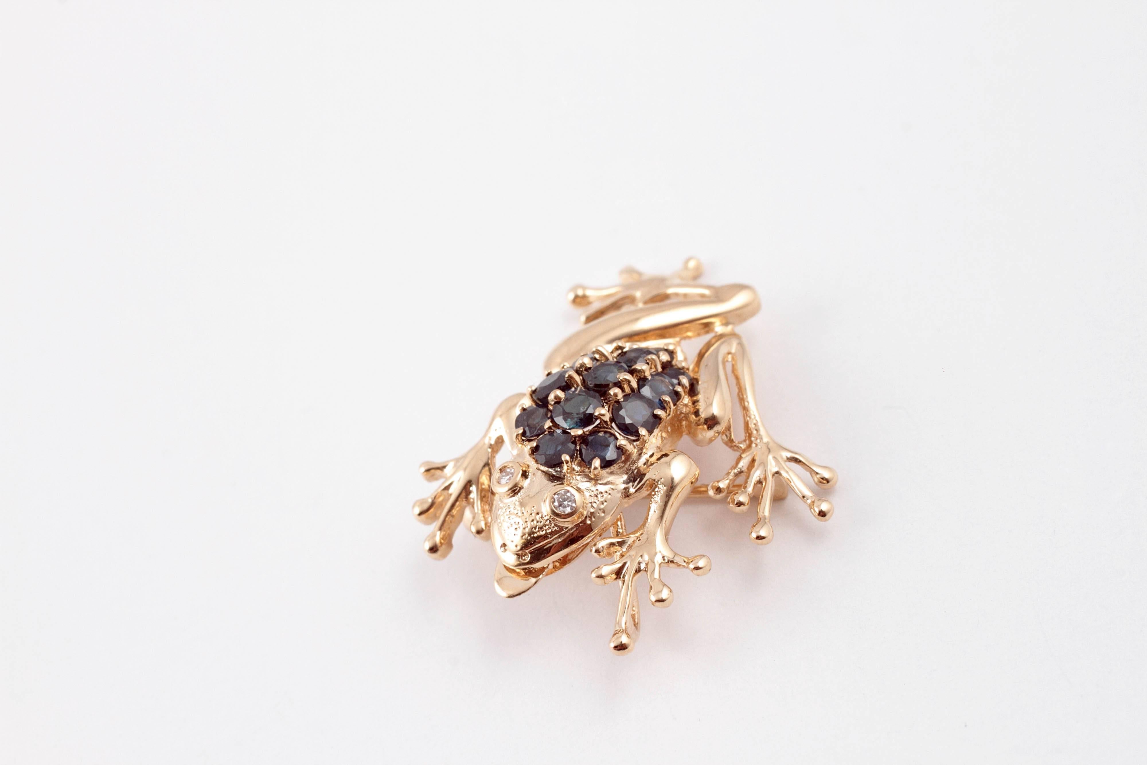 For the lover of froggies!  In 14 karat yellow gold with round blue sapphires. 1 1/2 inches in length.