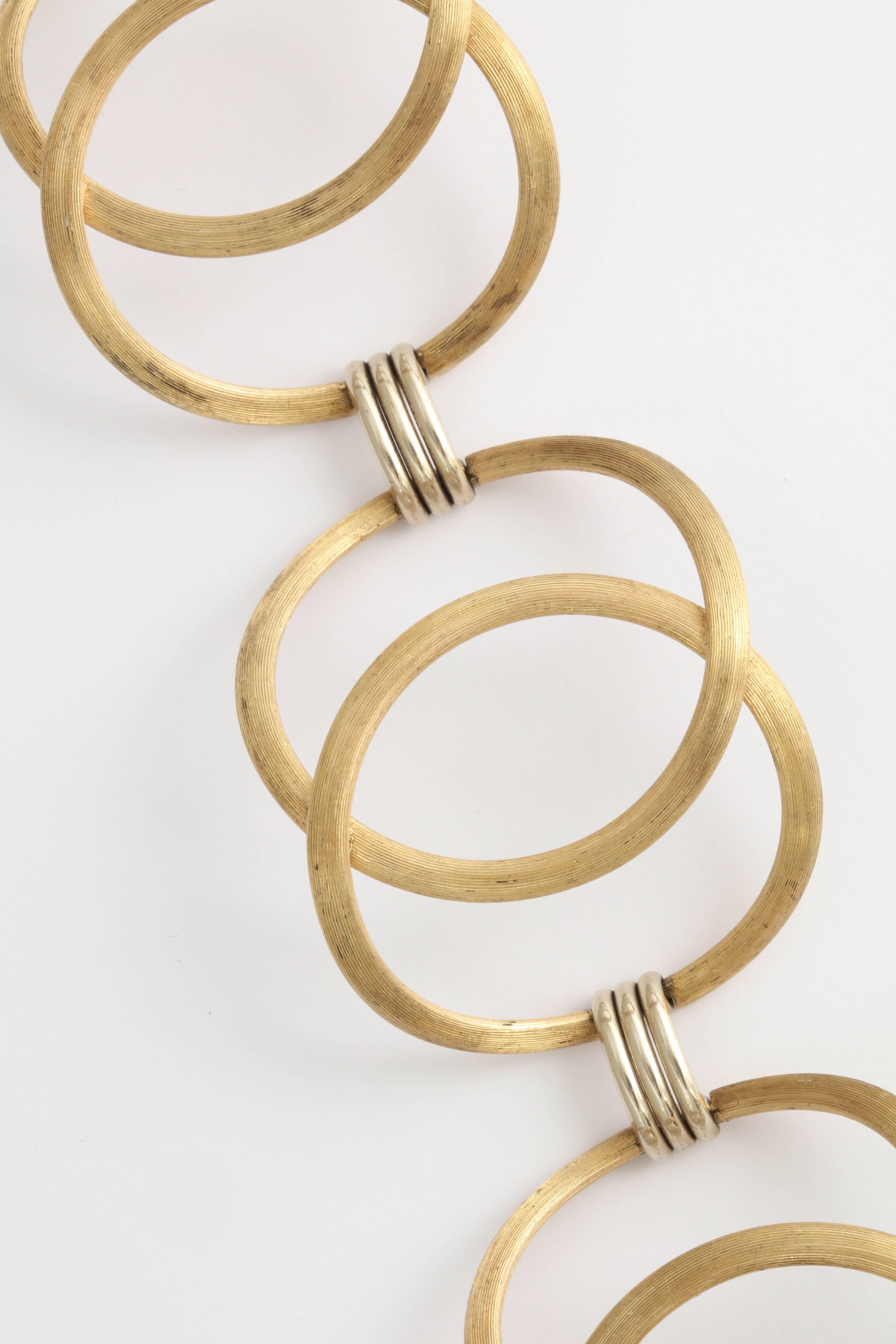 Great 50's-60's oval Link 14kt Yellow Gold brushed & Polished Bracelet.7 1/2" long. Very open & voluminous .  Great link in a light and airy manner.