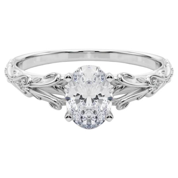 GIA 1,01ct Oval Vintage 3-Stone Heart 
Vine Anello di diamanti in oro bianco 18K