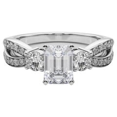 GIA 0,90ct Smeraldo a tre pietre con gambo diviso Pave Anello con diamante