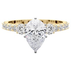 GIA 1,00ct Pear Three-Stone con gambo di diamante Anello di diamanti in oro giallo 18K