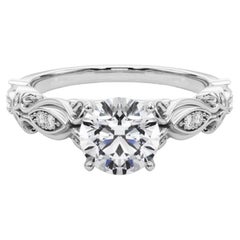GIA 0.91 Carat Round Vintage Scrolling Ribbon 18K White Gold Diamond Ring