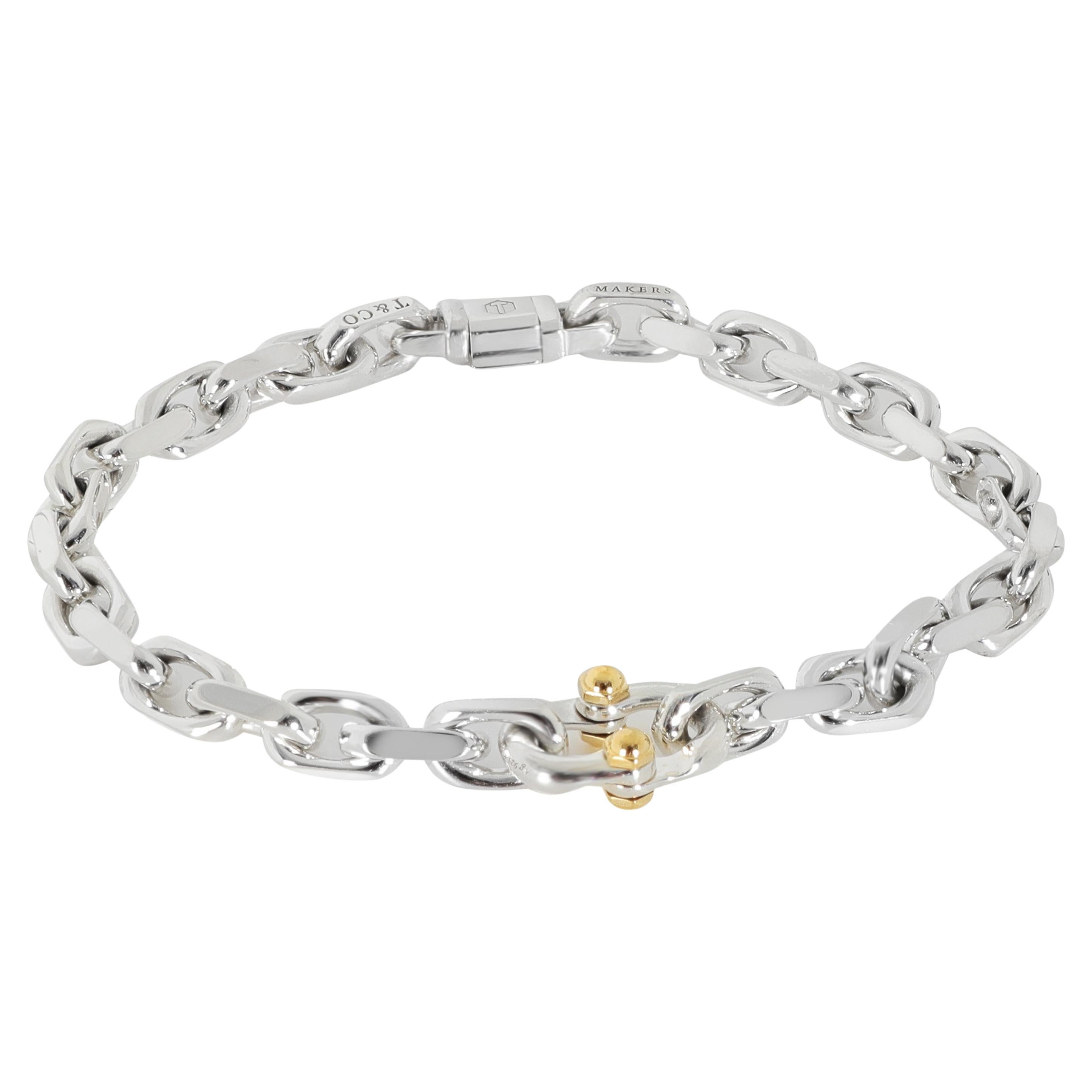 Tiffany & Co. Pulsera de oro amarillo y plata de ley con la marca del fabricante