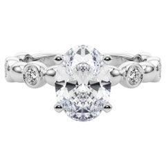 GIA 1,01ct Anello di diamanti solitario con castone e pietra ovale laterale