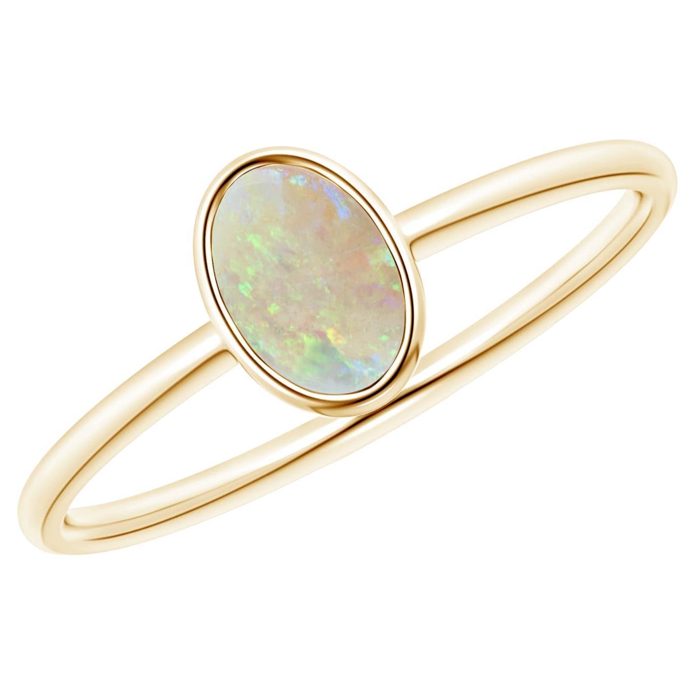 Angara Anillo Clásico Natural de Ópalo Ovalado Engastado en Bisel en Oro Macizo de 14 K para Mujer
