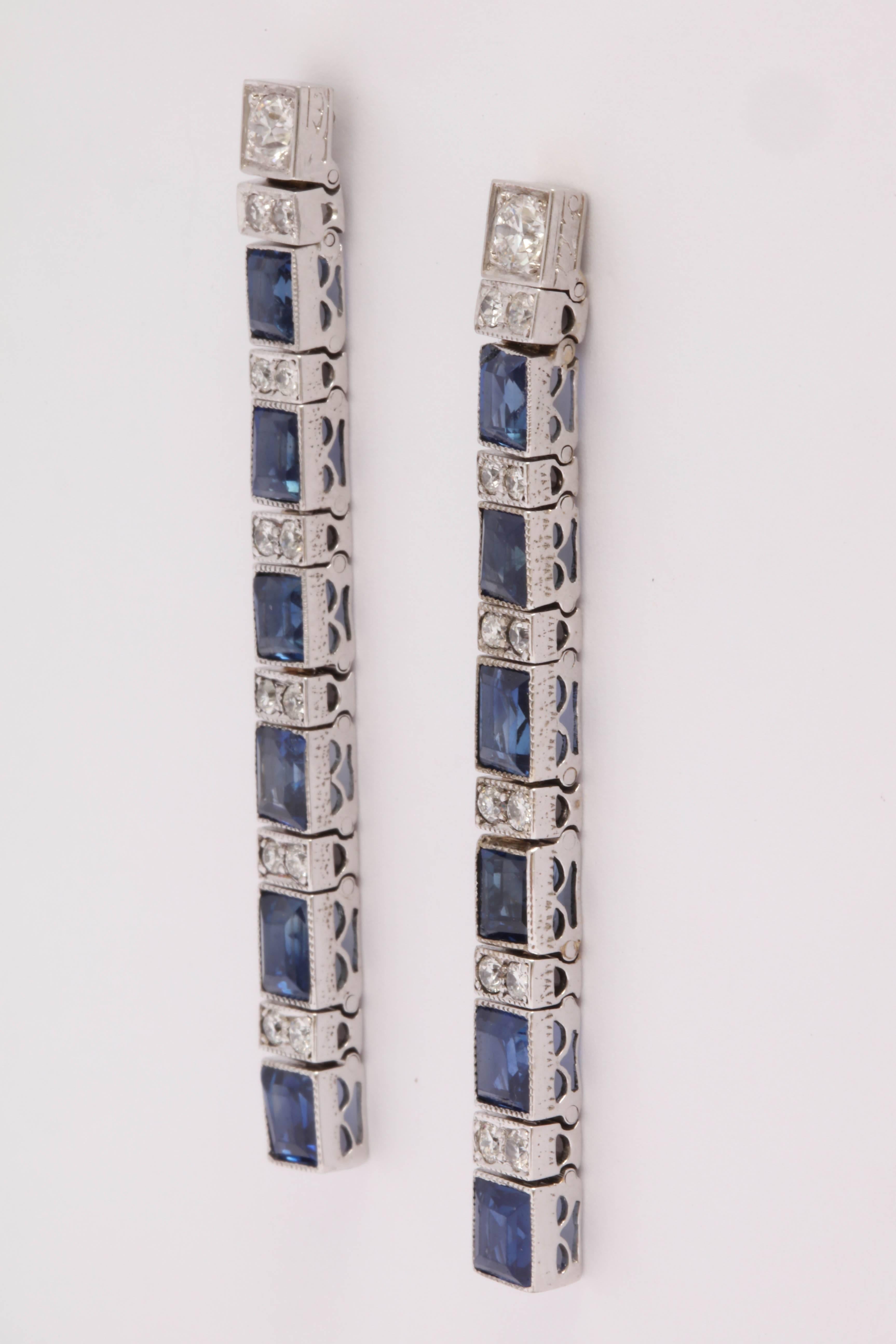 Made from a line bracelet, these Art  Deco dangles give a big look and have great movement to them. Approximately 7.9cts of sapphires and 1.2cts of diamonds. Lovely miligraining on the front. 