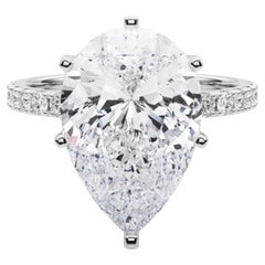 GIA 7.01ct Pear Solitaire with Half Eternity 18K White Gold Diamond Ring